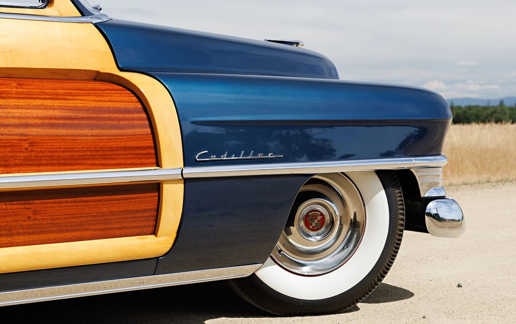 A Cadillac Woodie Sedan? This Wood-Paneled 1951 Cadillac Series 75 Was Once Owned By Gene Autry 11 Front end of a blue 1951 Cadillac Series 75 with wood-paneled doors