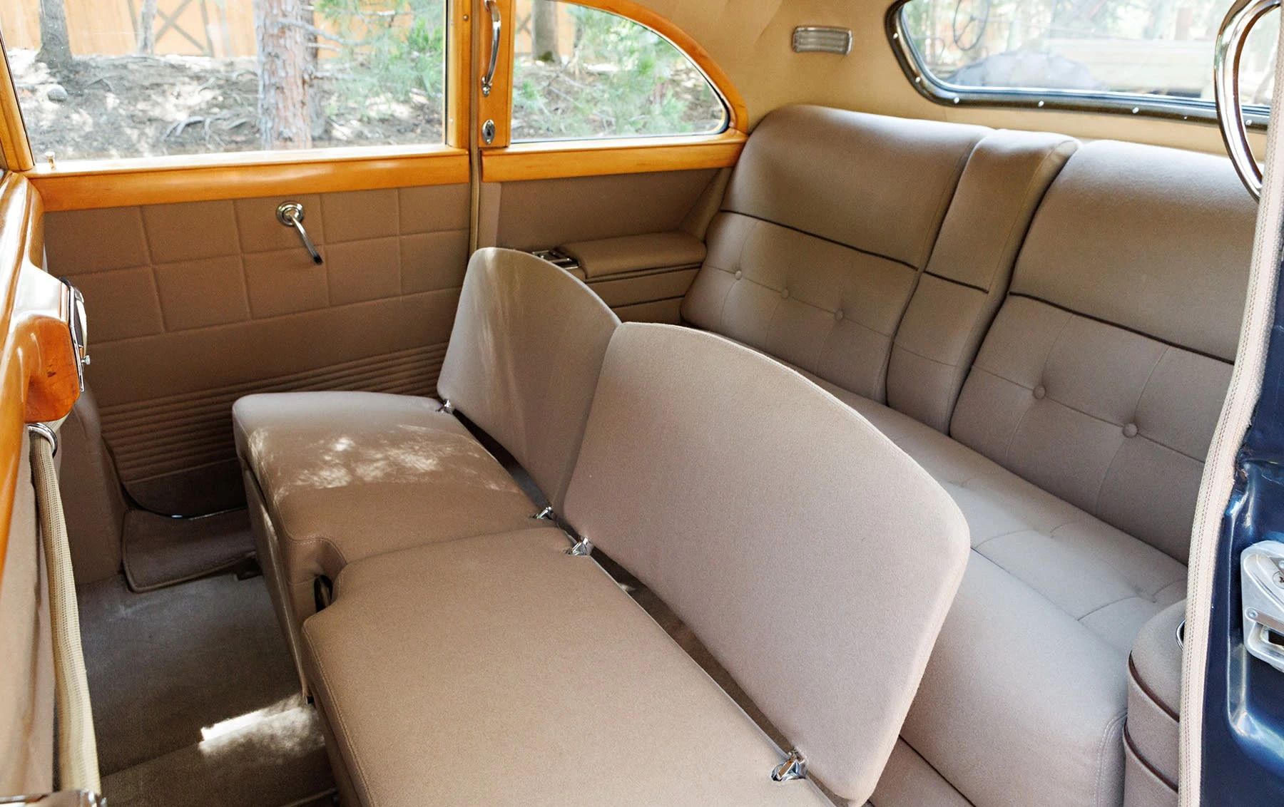 A Cadillac Woodie Sedan? This Wood-Paneled 1951 Cadillac Series 75 Was Once Owned By Gene Autry 8 Rear seating area of a 1951 Series 75 with the jump seats in place