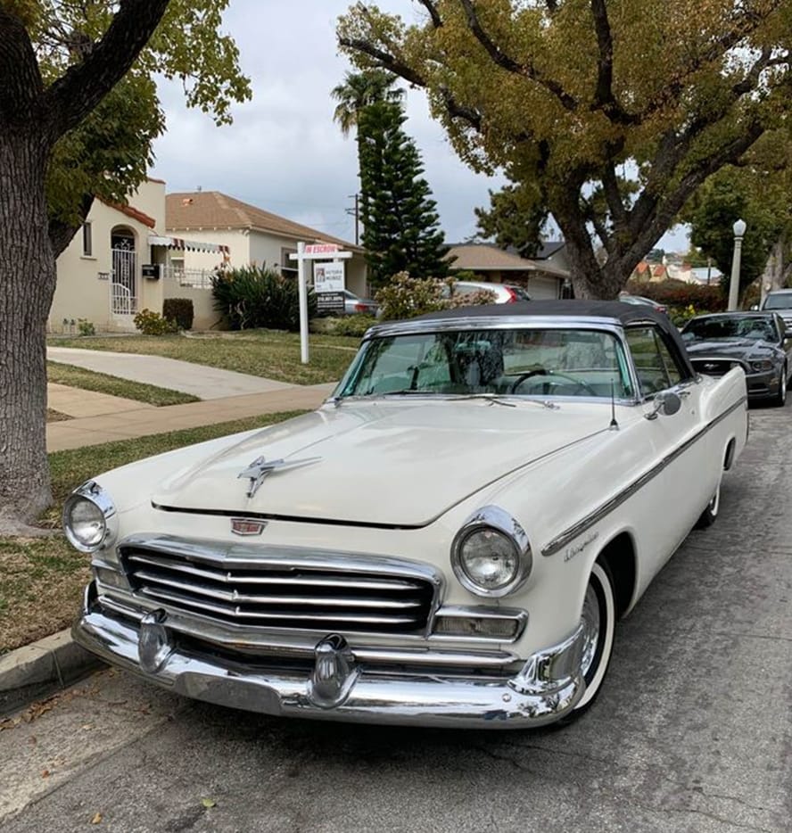 Left front 3q view of a white 1956 Chrysler convertible