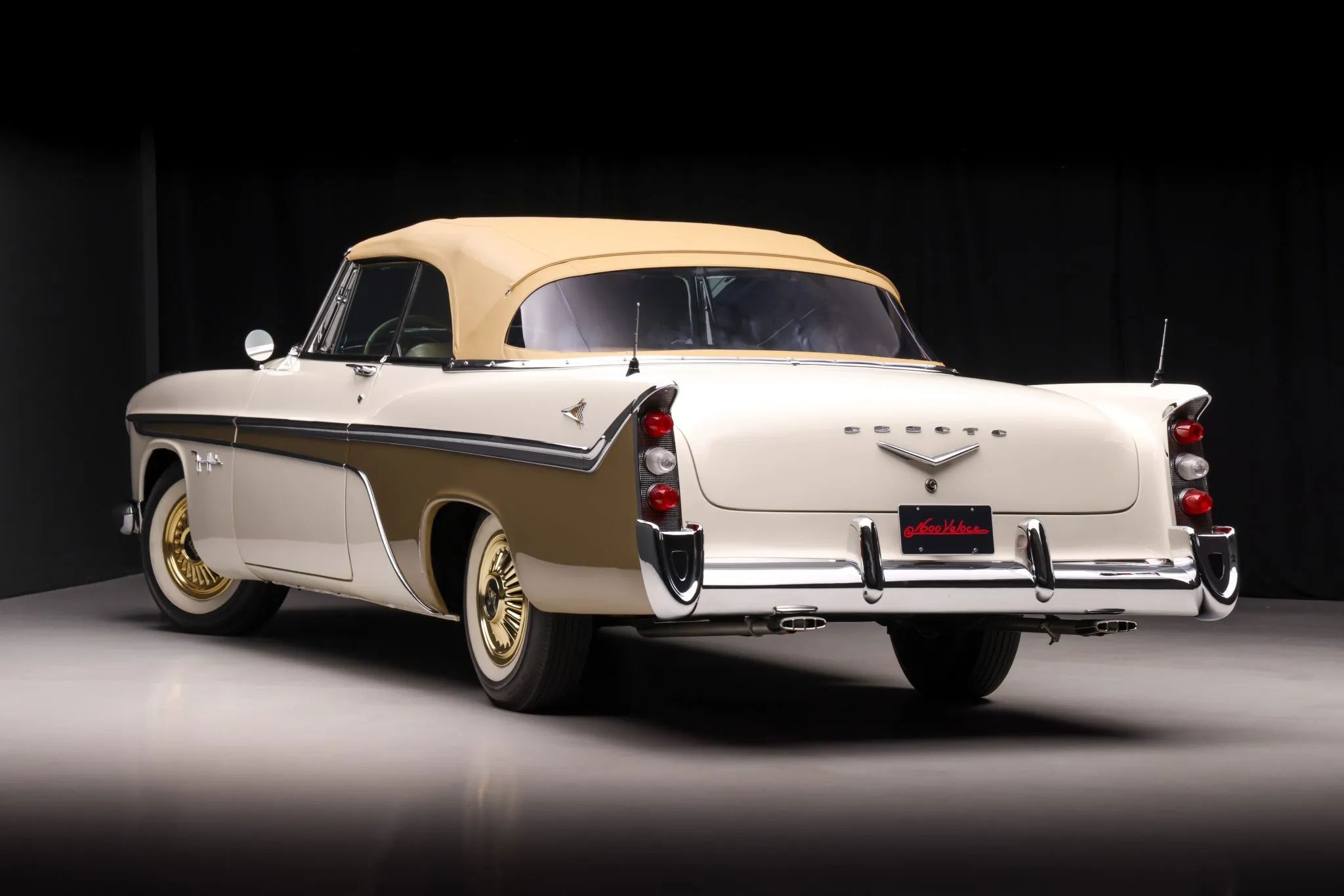 Studio shot of the left rear 3q view of a 1956 DeSoto convertible with the top up