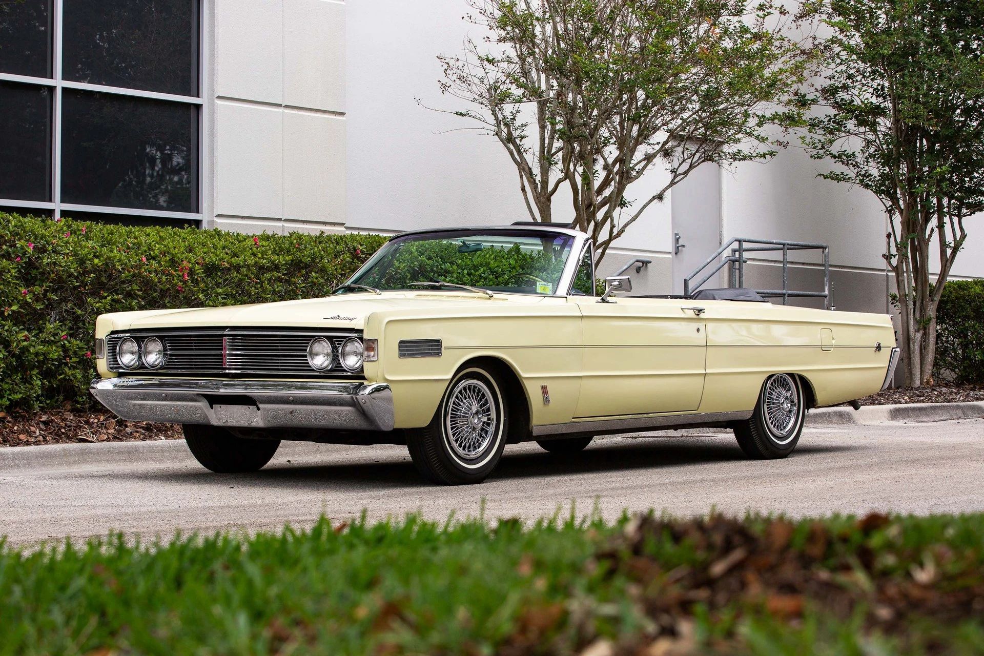 Left front 3q view of a yellow 1966 Mercury S-55 convertible