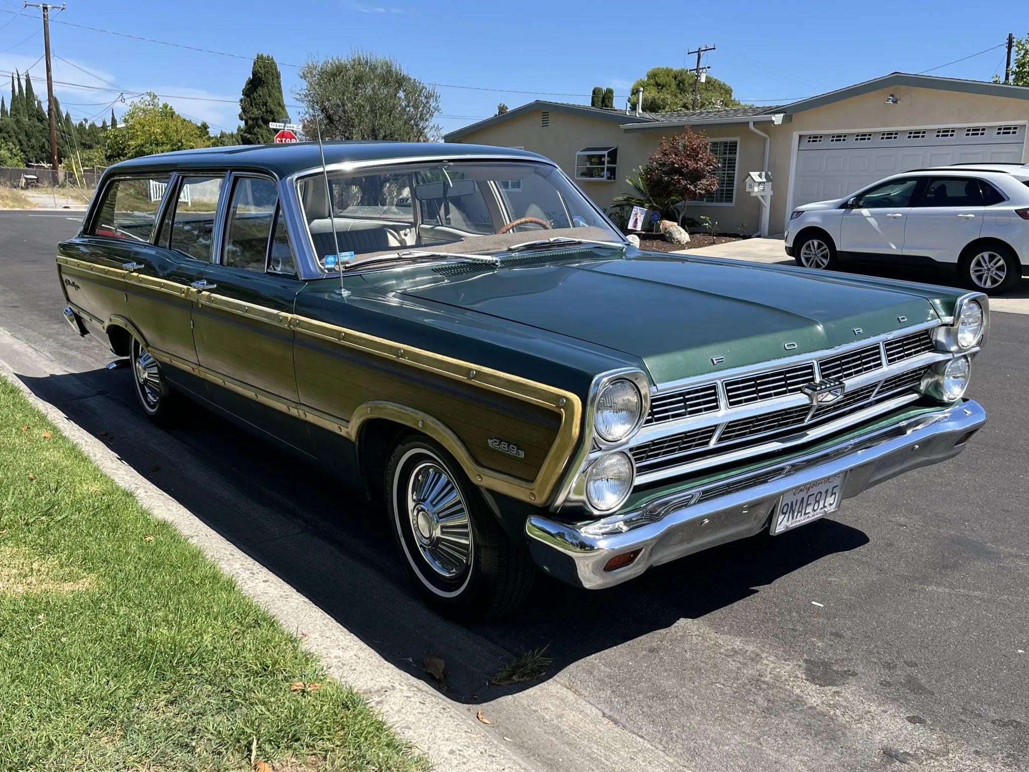 1967 Ford Fairlane Squire 3-Speed: Rare Midsize Stick-Shift Faux Woodie Wagon, But Why Did It Sell For $20K? 3 Right front 3q view of a 1967 Fairlane Squire four-door station wagon