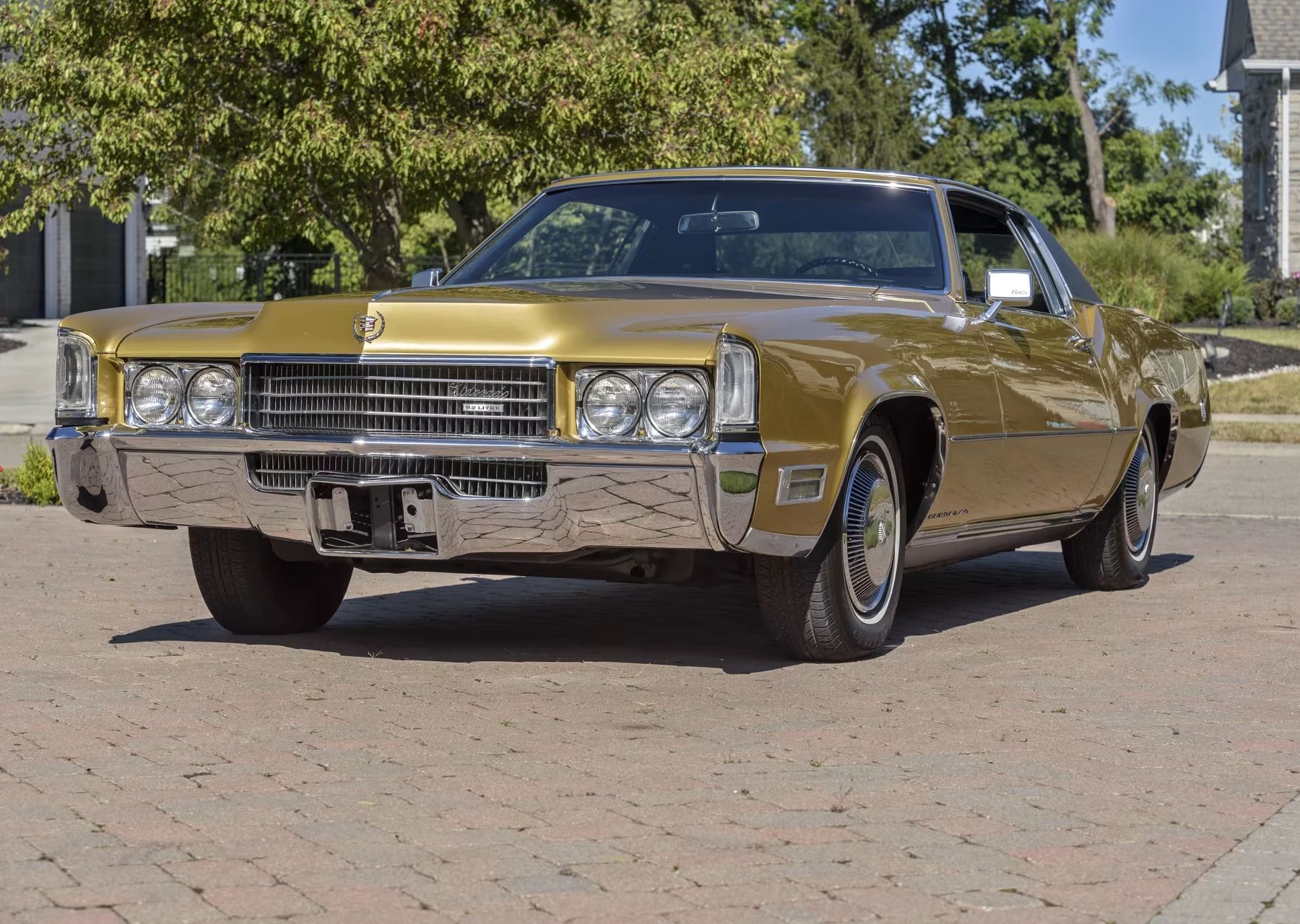 Vintage C/D Review: 1970 Cadillac Eldorado Was Powerful, Pricey, and Prestigious – So, Why Did They Photograph It Outside A Check-Cashing Place? 2 Left front 3q view of a gold Eldorado