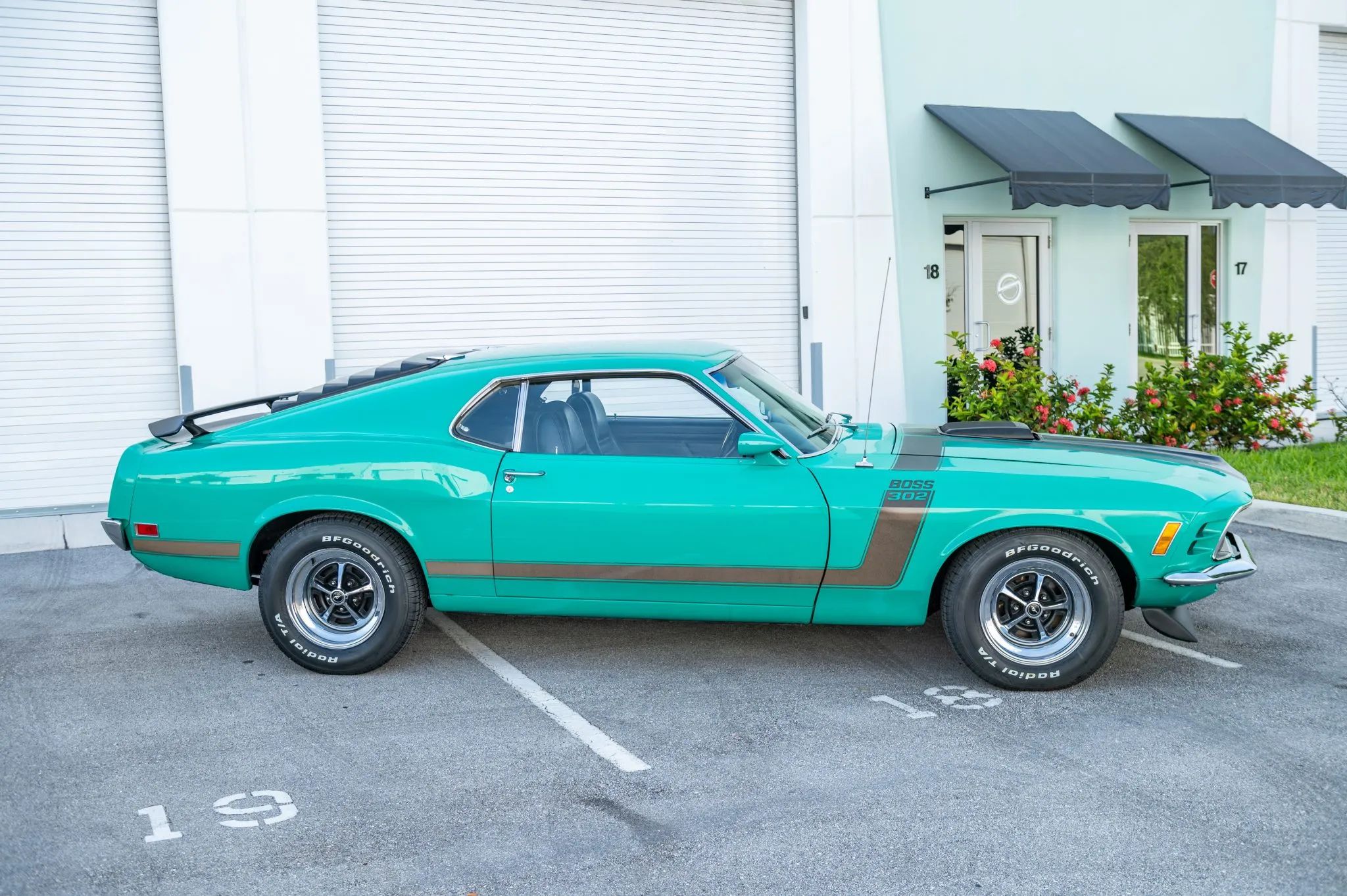 What Really Killed Muscle Cars In The '70s - Two Vintage Articles Try To Explain: "The Insurance Squeeze" And "What Price Muscle" 25 Right side view of a Grabber Green 1970 Ford Mustang Boss 302
