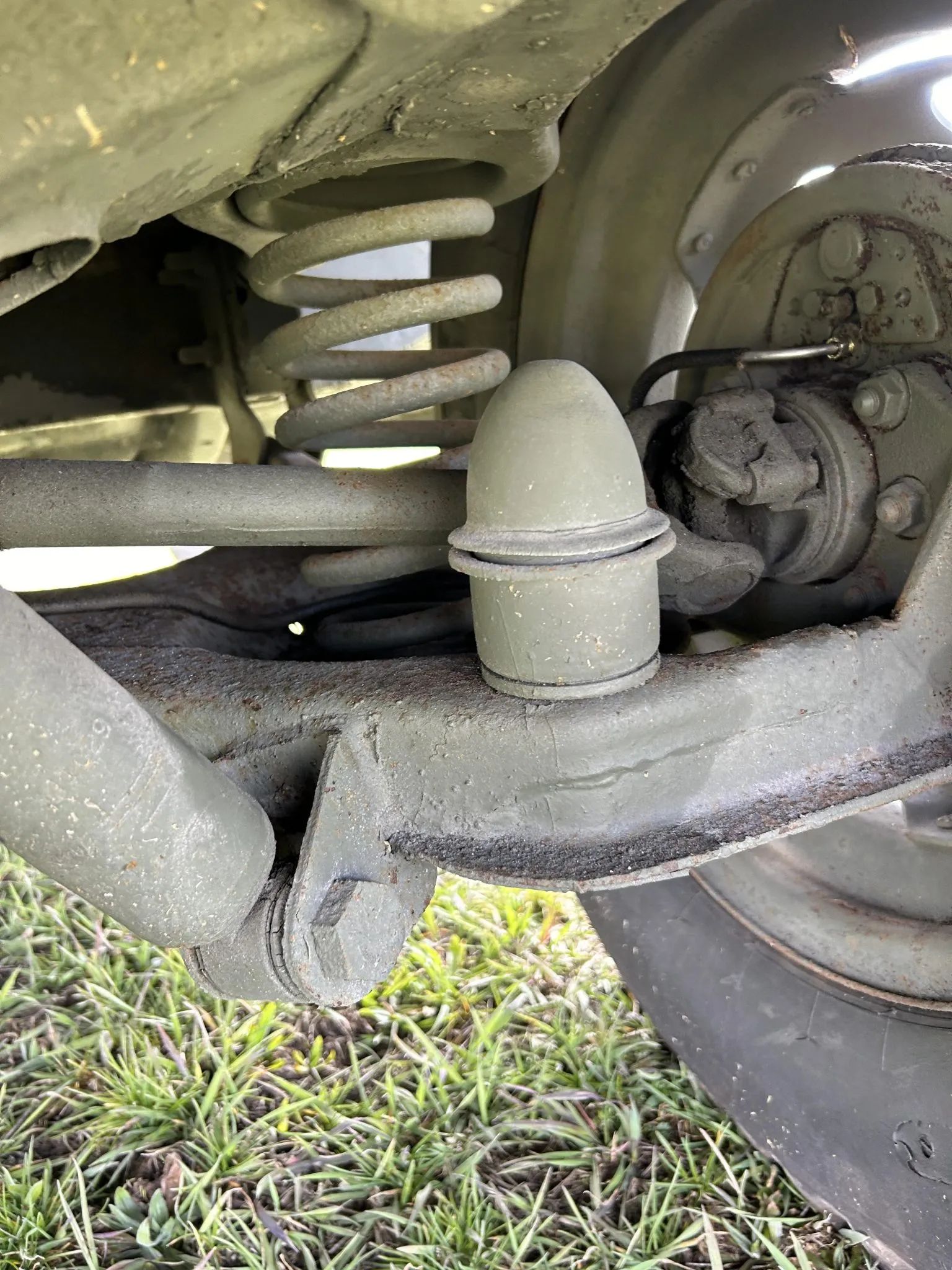 Ford M151 1/4-Ton Utility Truck: Why The Suspension Of The Military's Jeep Successor Made It Too Dangerous For Civilians 13 Photo of the rear suspension of an M151A2, showing the large rubber bump stop