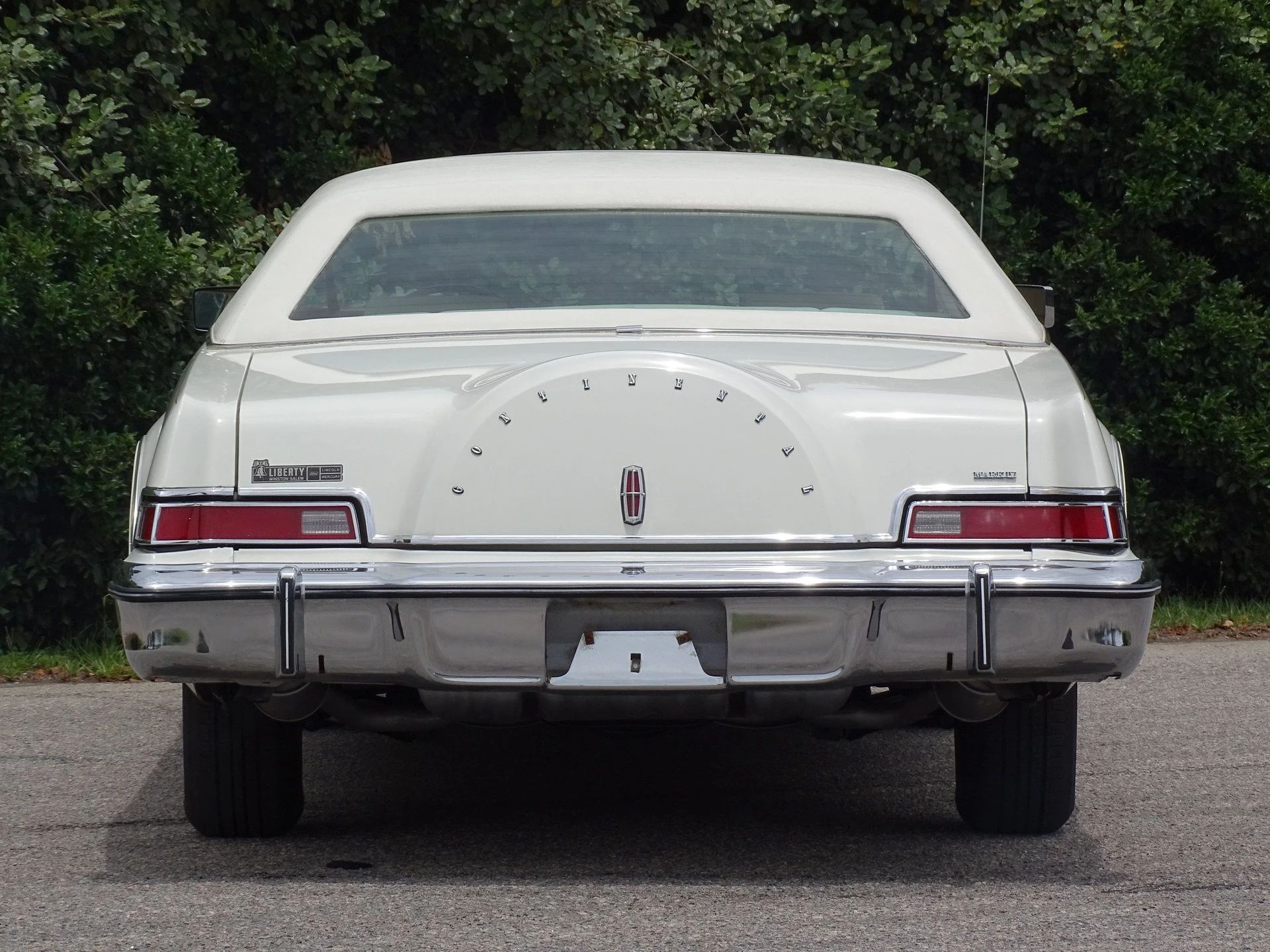 Rear view of a white 1975 Mark IV