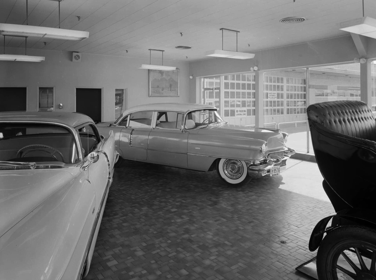 Vintage Photos Of A Cadillac Dealership At The Height of 1957 Luxury 2 B&W photo of two more 1957 Cadillacs in a showroom