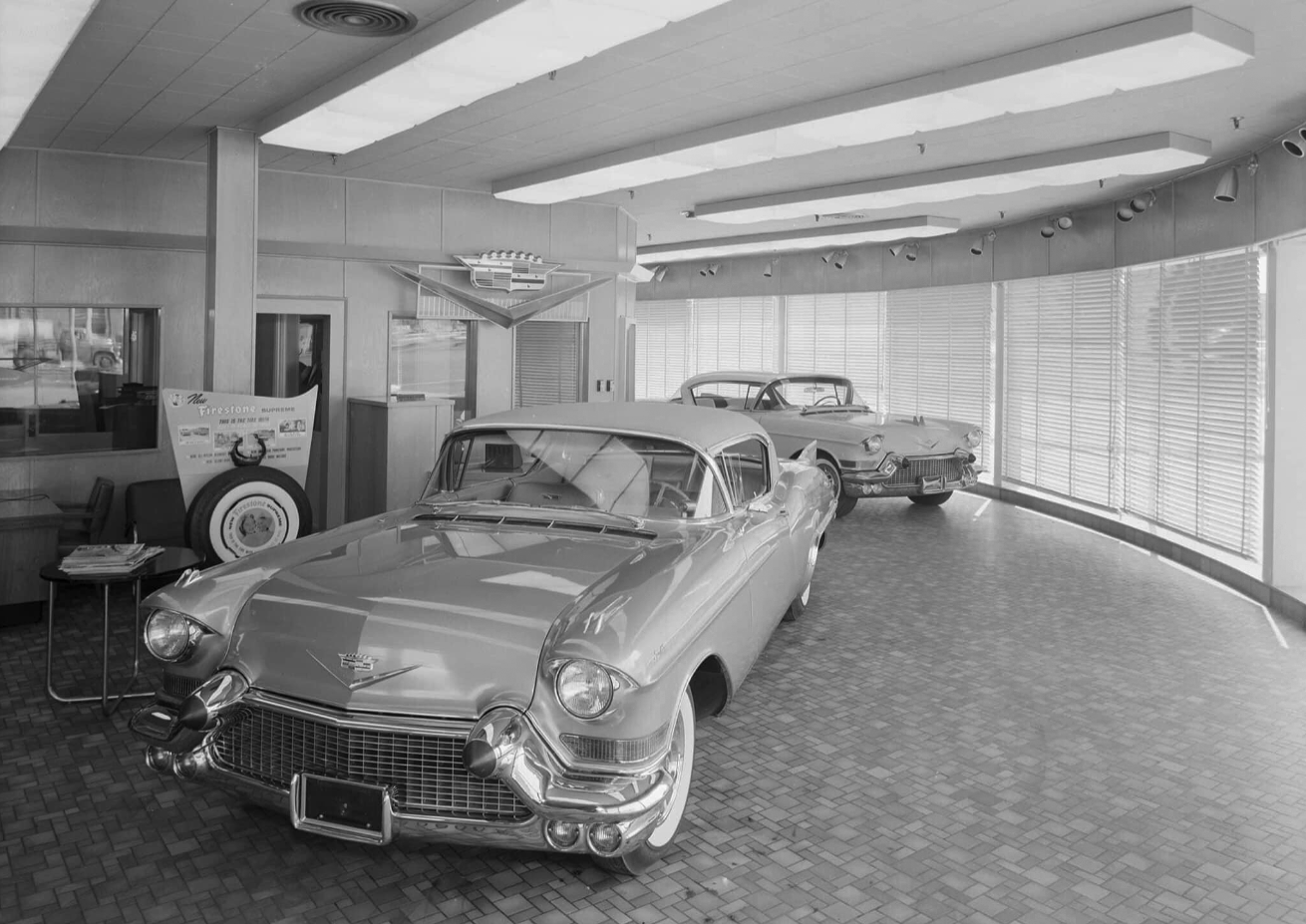 Vintage Photos Of A Cadillac Dealership At The Height of 1957 Luxury 1 B&W photo of new 1957 Cadillacs in a showroom