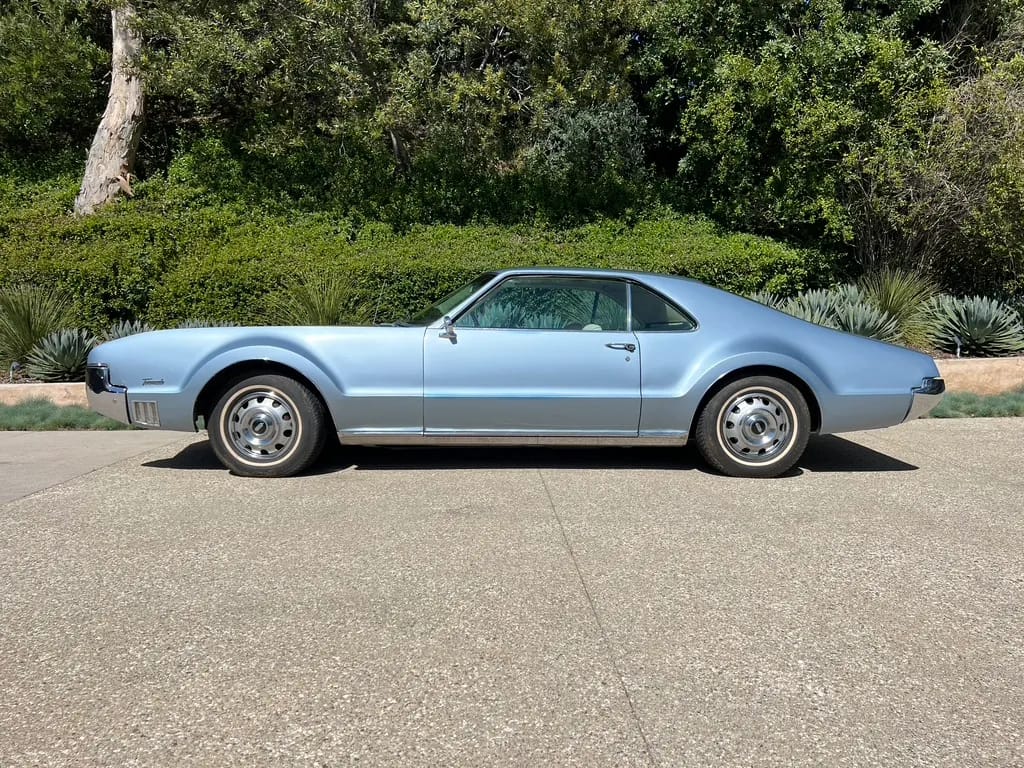 1966 Oldsmobile Toronados In (Almost) Every Color: A Masterpiece In Any Tone 1 Image of a Lucerne Blue 1966 Oldsmobile Toronado in profile