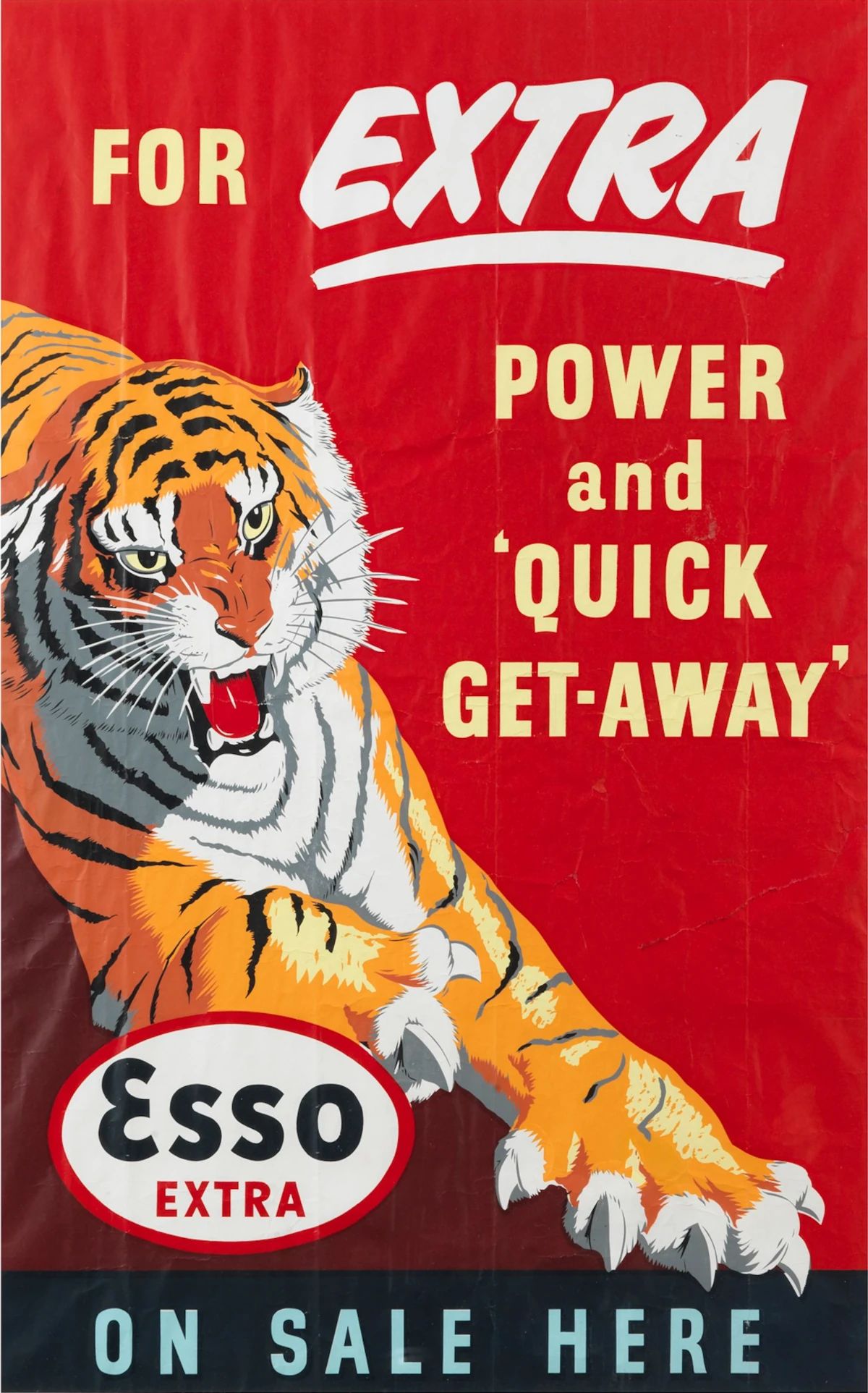 Esso Extra ad showing a growling tiger with the headline "For EXTRA Power and 'Quick Get-Away'"