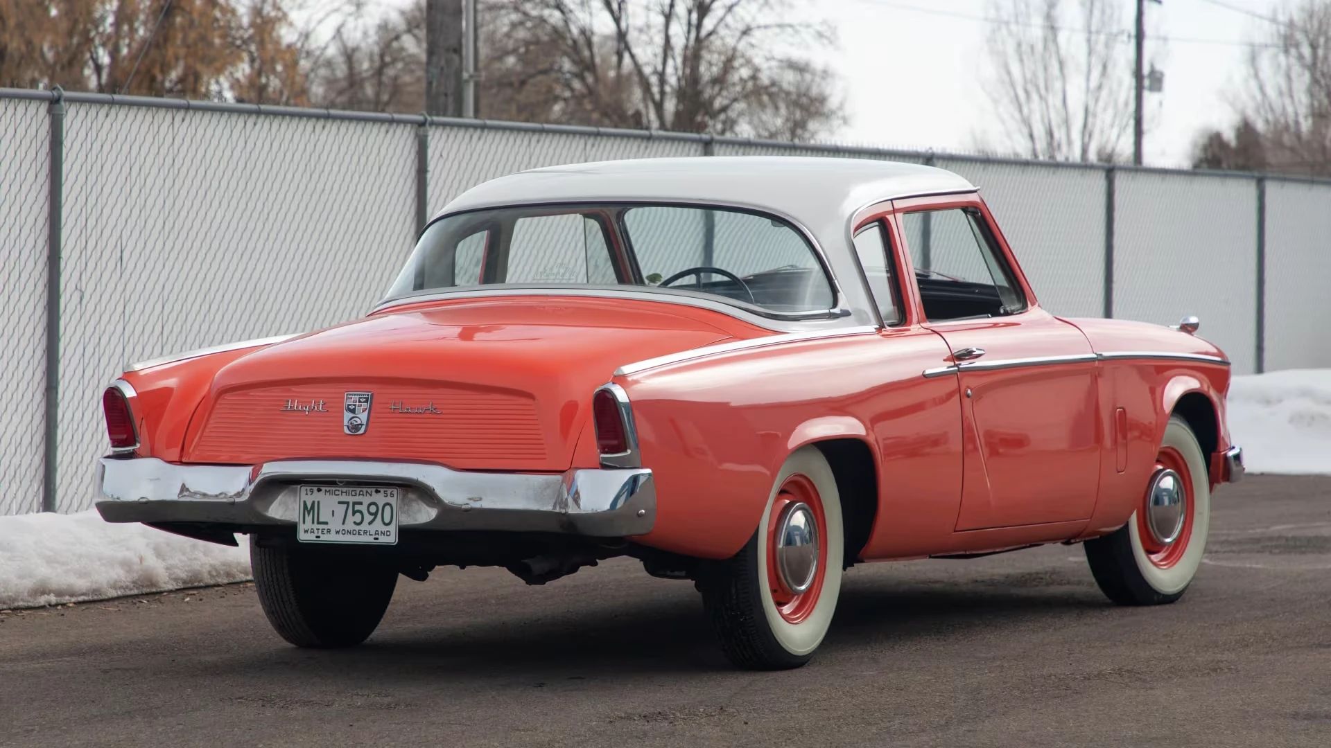 Studebaker Hawk: How Studebaker Made A Mess Of This Raymond Loewy Classic, And How Brooks Stevens Brought It Back 16 Right rear 3q view of a salmon-colored 1956 Studebaker Hawk pillared coupe