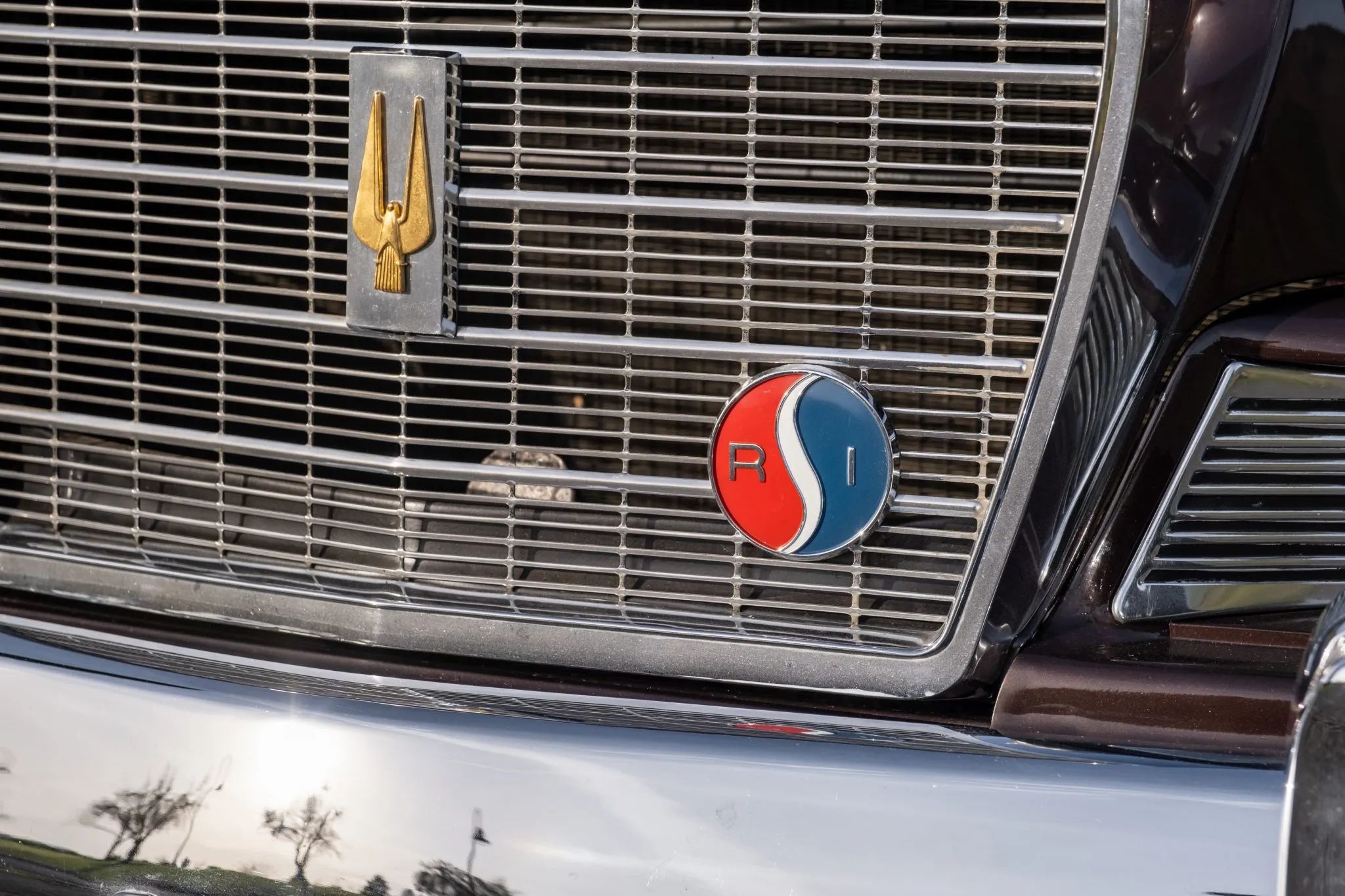 Studebaker Hawk: How Studebaker Made A Mess Of This Raymond Loewy Classic, And How Brooks Stevens Brought It Back 57 R1 badge on the grille of a 1964 Studebaker GT Hawk