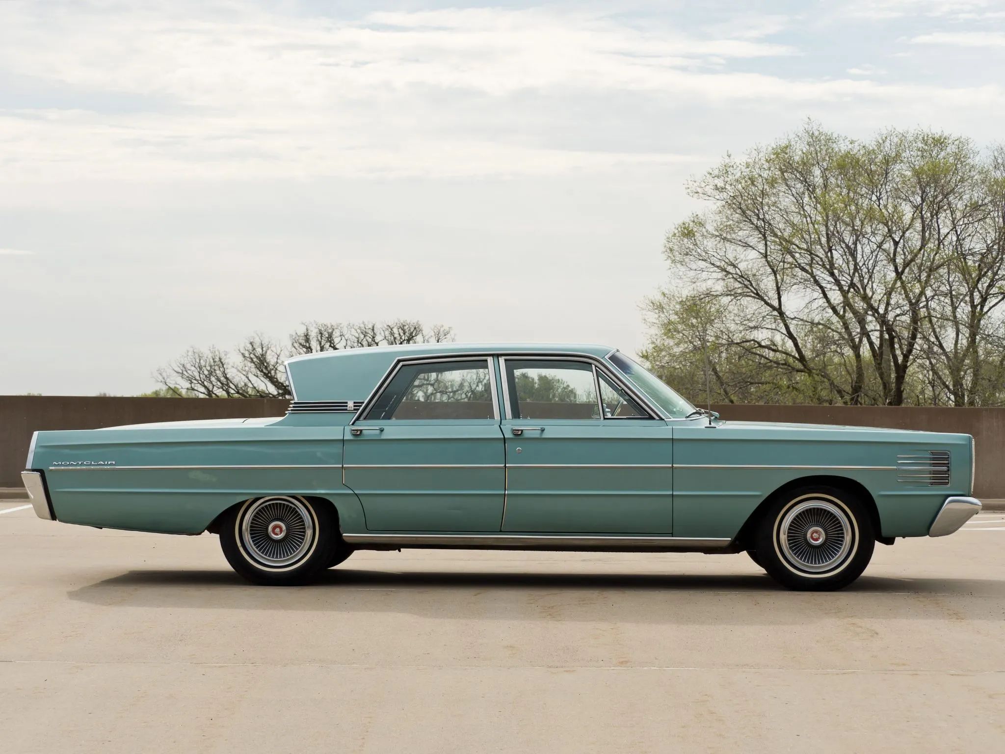 1966 Mercury Park Lane Vs. Ford LTD: Did The LTD Make Ford's Mid-Priced Mercury Obsolete? 4 Right side view of a 1965 Mercury four-door with the Breezeway roof