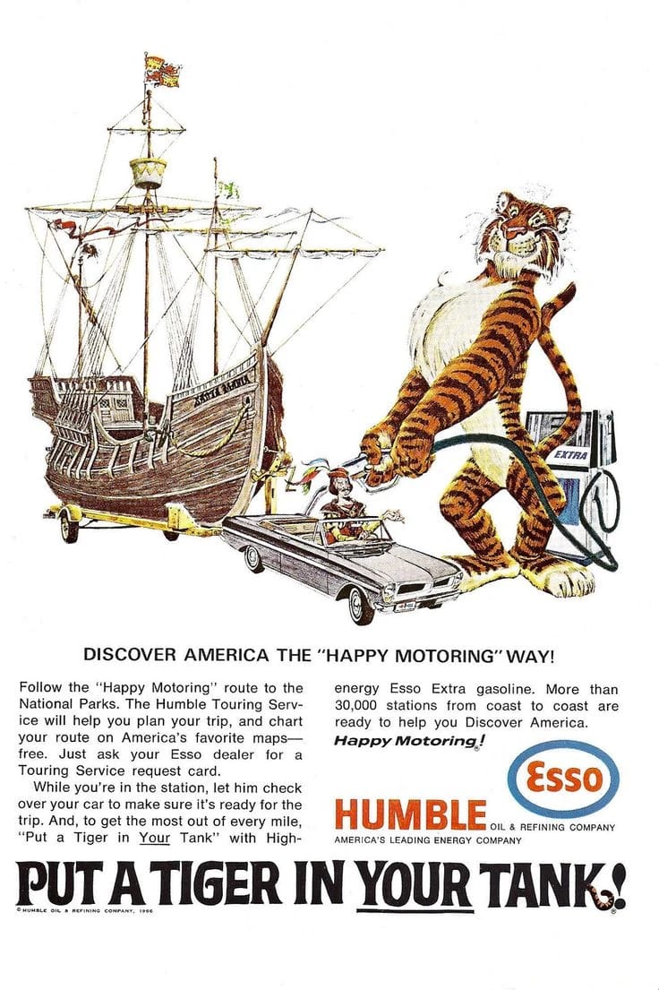 1966 Esso "Put a Tiger in Your Tank" ad showing the tiger adding fuel to a convertible driven by a Spanish sailor, towing an old sailing ship, with the headline "Discover America the 'Happy Motoring' Way" and copy encouraging readers to visit National Parks