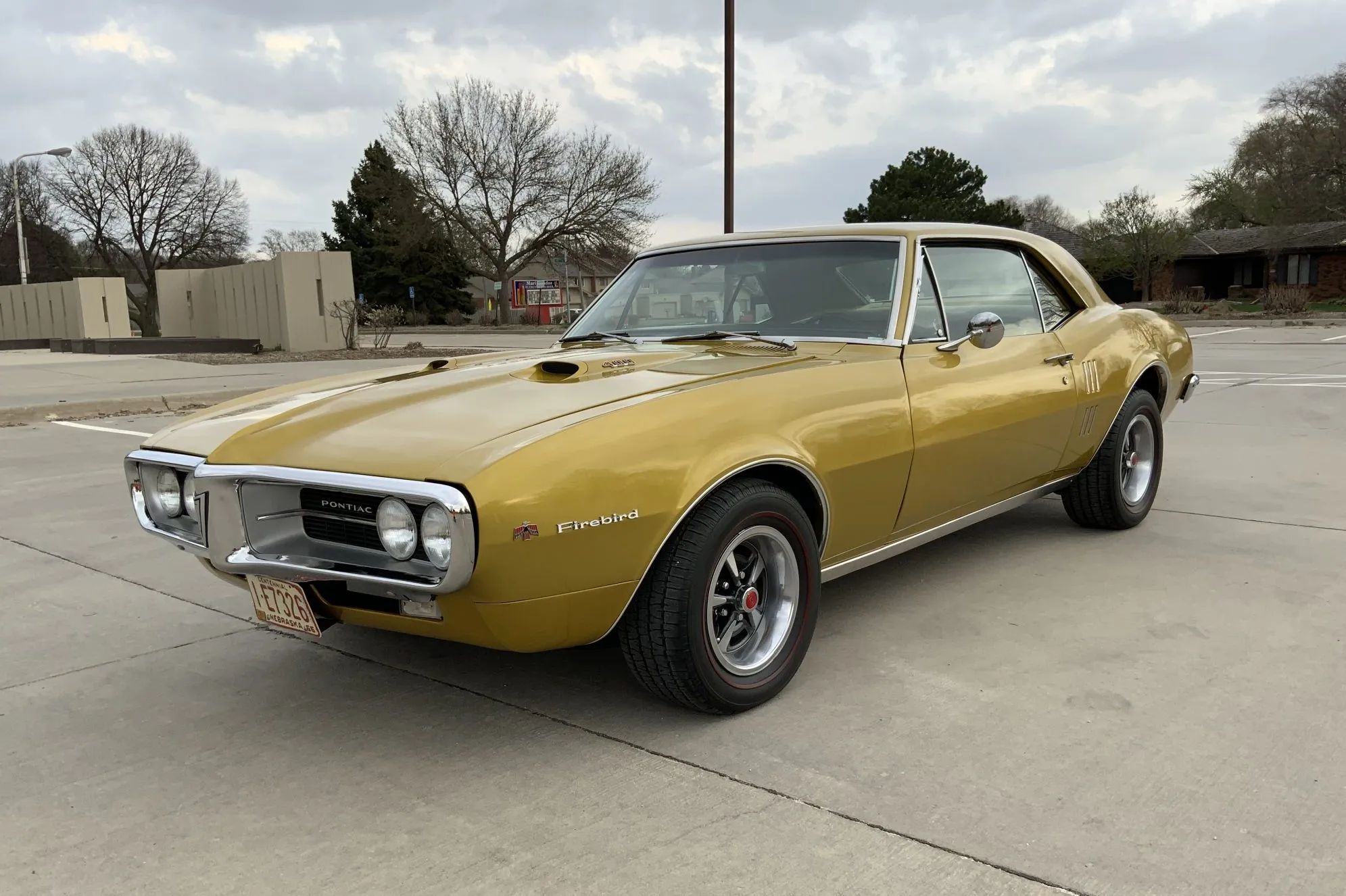 Left front 3q view of a gold 1967 Firebird hardtop