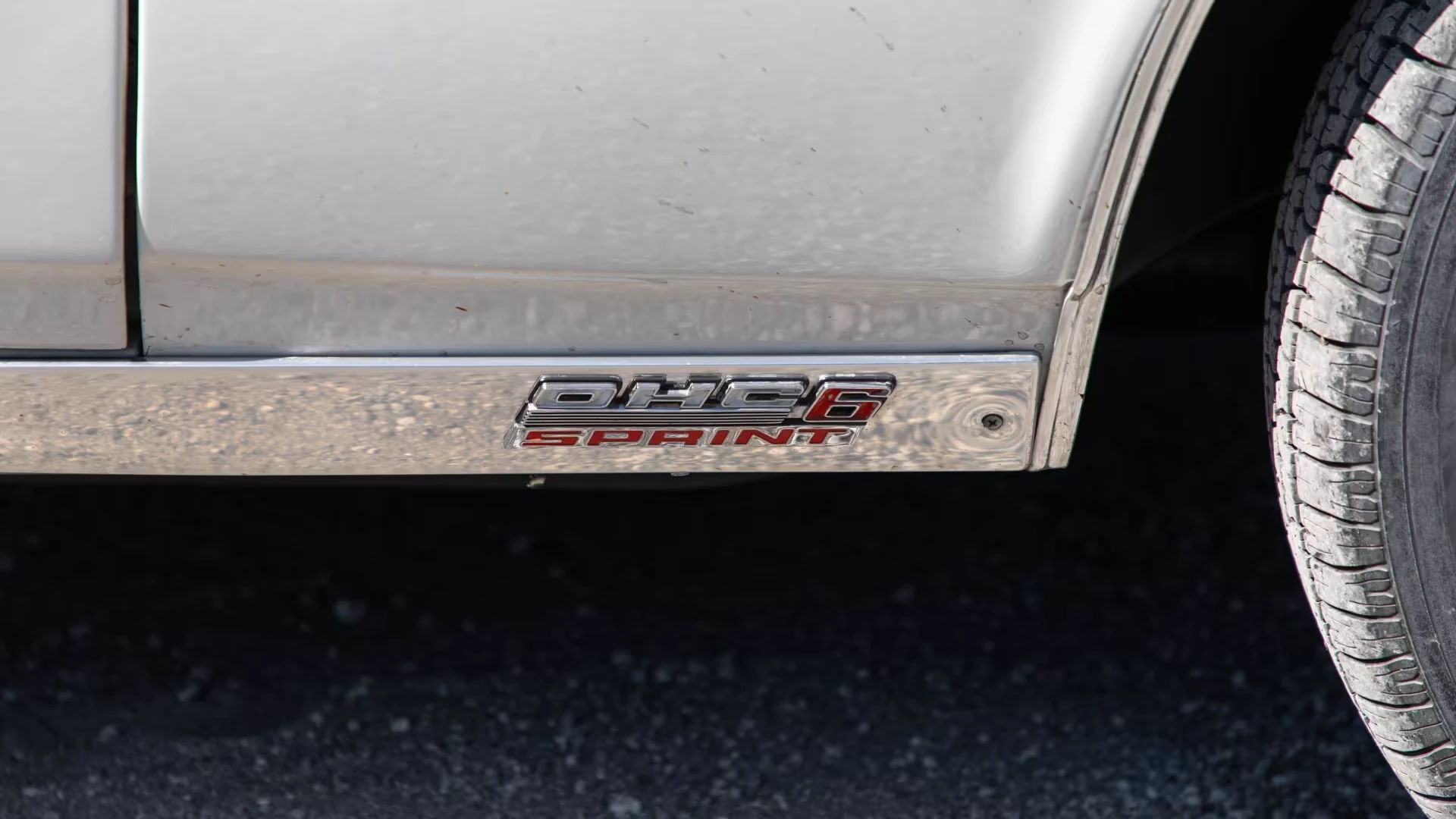OHC 6 Sprint badge on the rocker of a 1967 Firebird