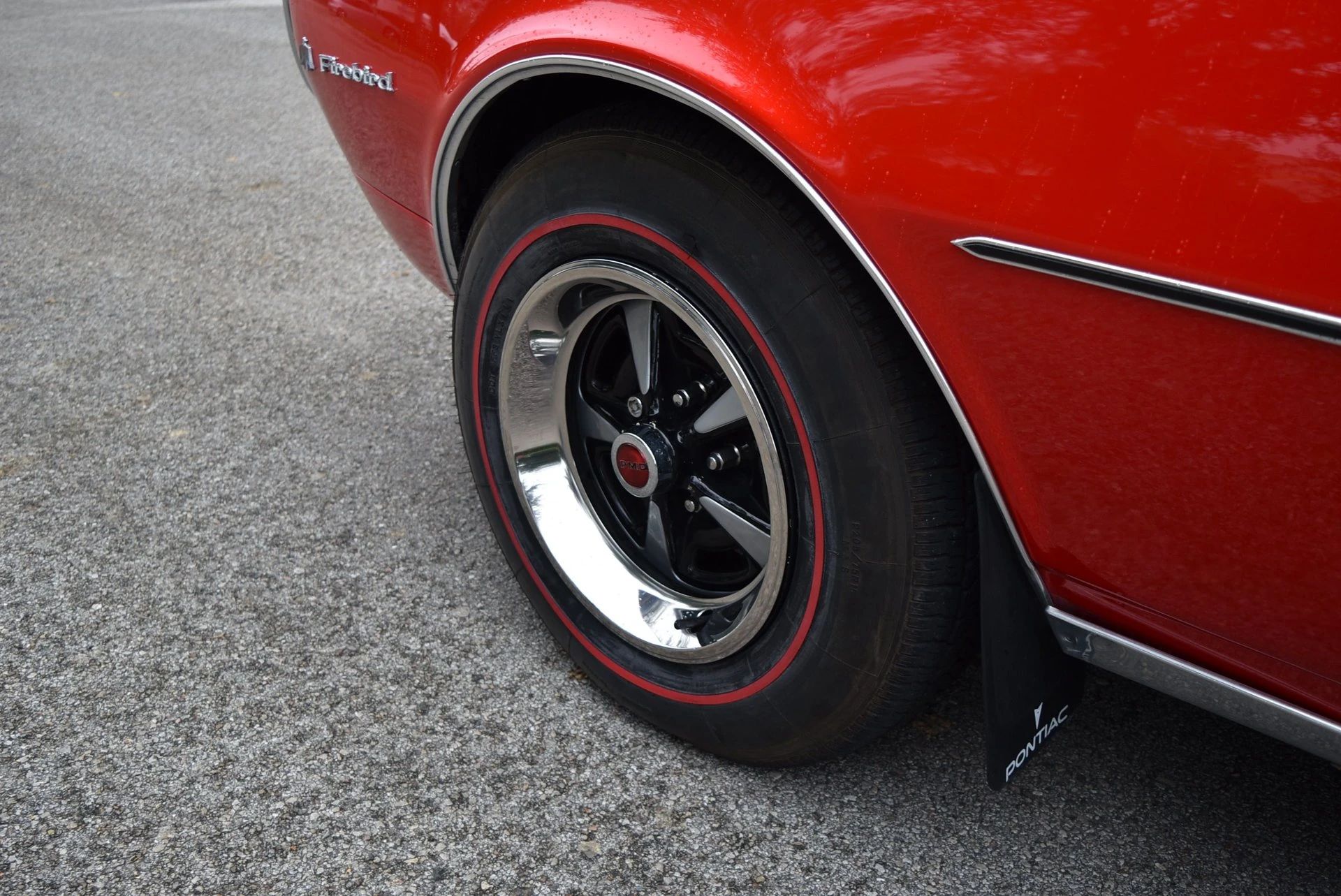 1967 Pontiac Firebird Sprint OHC Versus Firebird 400 (Vintage Car Life Comparison): Overhead Cam Versus Cubic Inches 18 Left front wheel of a 1967 Firebird
