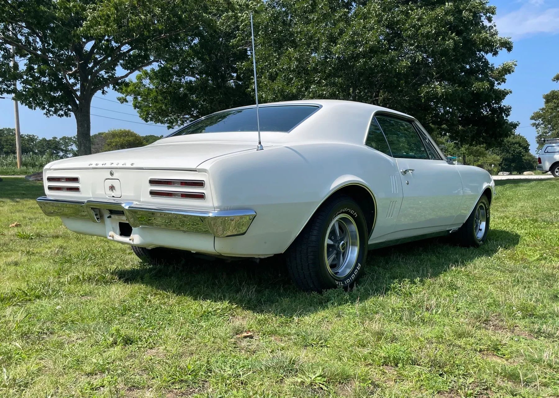 1967 Pontiac Firebird Sprint OHC Versus Firebird 400 (Vintage Car Life Comparison): Overhead Cam Versus Cubic Inches 25 Right rear 3q view of a 1967 Firebird hardtop