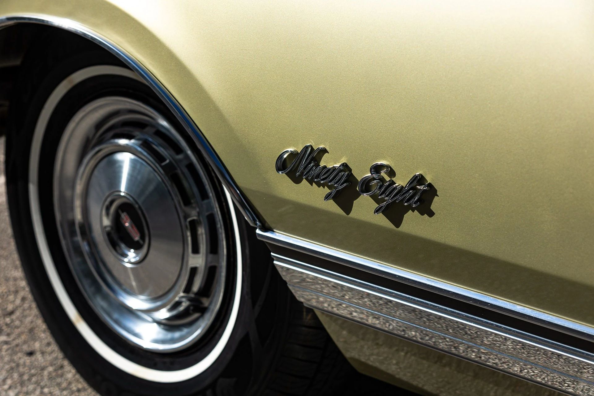1946 and 1968 Oldsmobile 98 Sedans: Cadillac Luxury From GM's Mid-Priced Brand 2 "Ninety-Eight" badge on the fender of a 1968 Oldsmobile