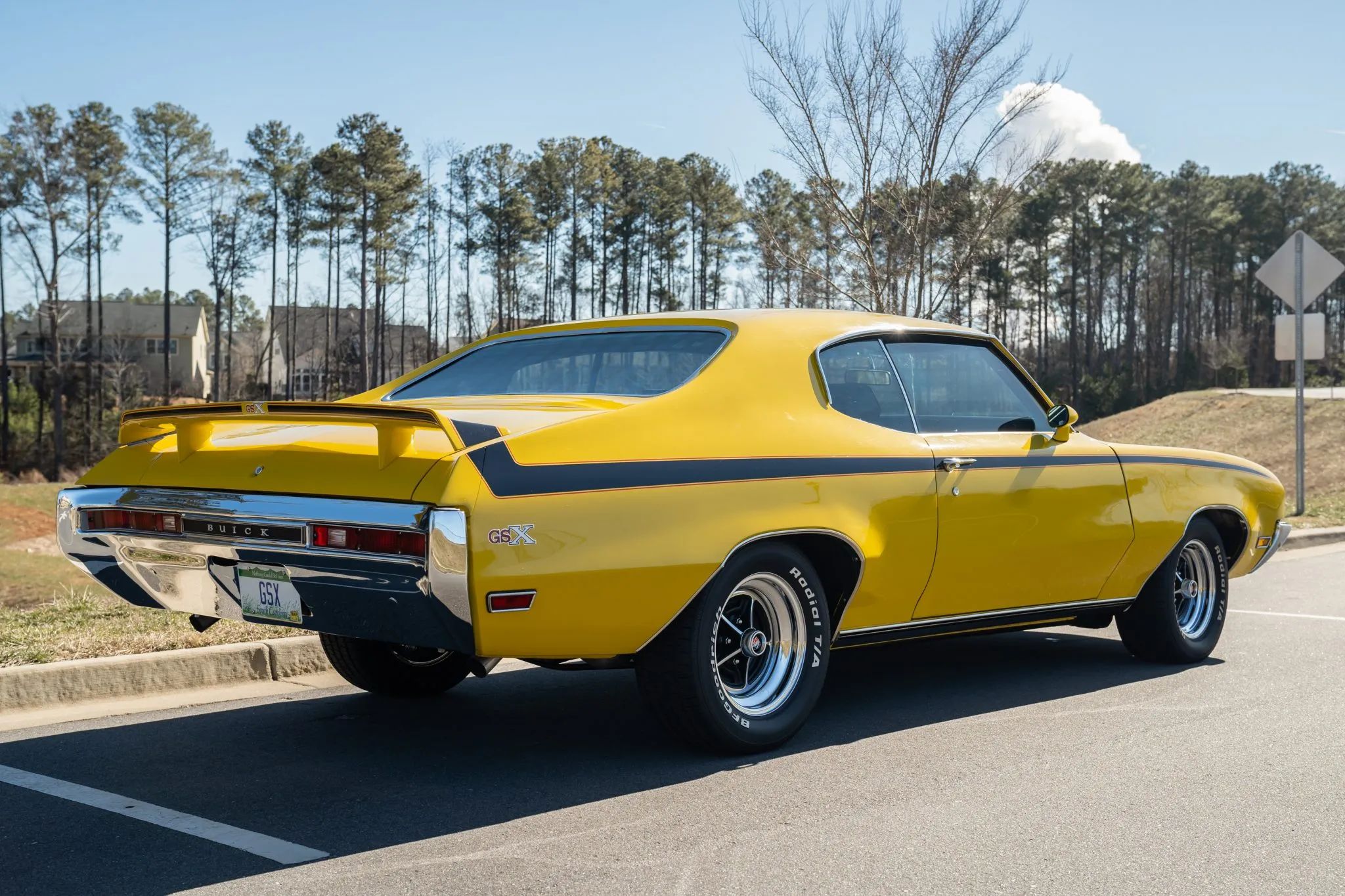 Rear three-quarter view of Saturn Yellow 1970 Buick GSX