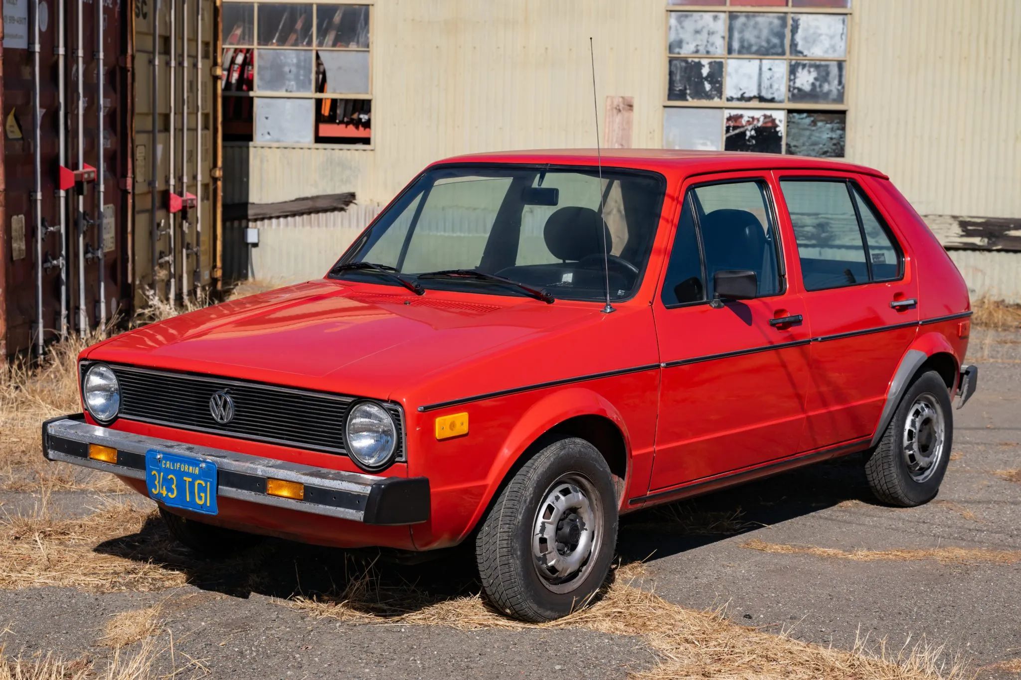 1979 Volkswagen Rabbit: VW Jumps The Shark With A Baby Blue Rabbit Made In the USA 4 Left front 3q view of a red 1977 Rabbit five-door