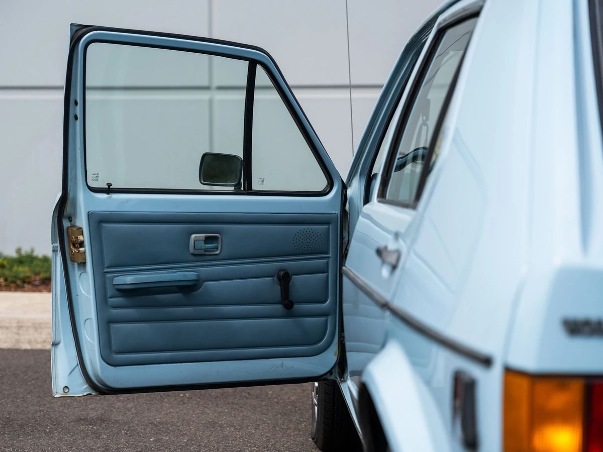 1979 Volkswagen Rabbit: VW Jumps The Shark With A Baby Blue Rabbit Made In the USA 13 Driver's door trim of a blue 1979 VW Rabbit five-door