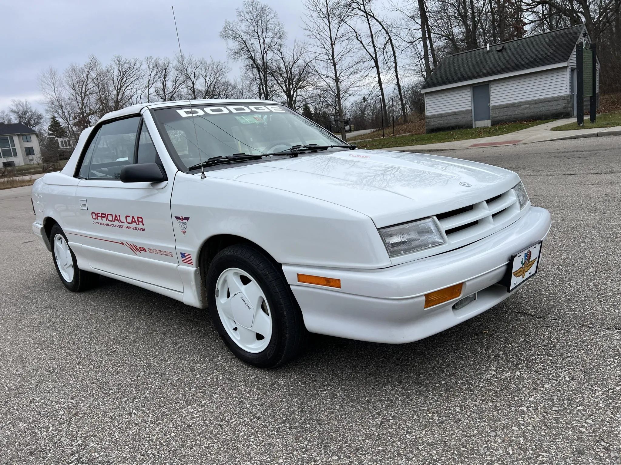 1989 Dodge Caravan Turbo and 1990 Plymouth Voyager Turbo: Rare Turbocharged Four-Cylinder Chrysler Minivans 27 Right front 3q view of a 1991 Dodge Shadow convertible with decals on the door