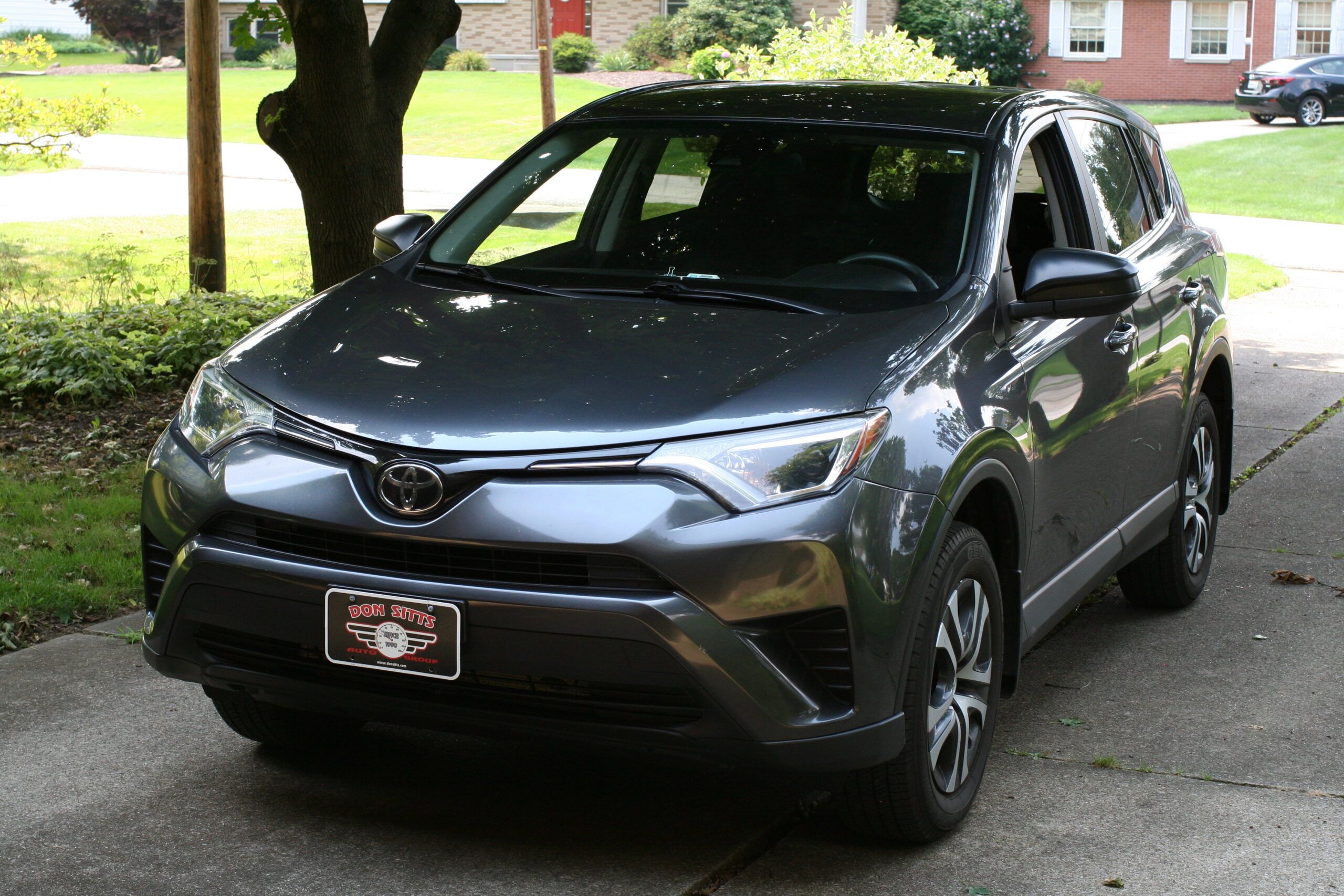 Our 2017 RAV4: Living With Our First SUV 1 2017 RAV4 in driveway scaled