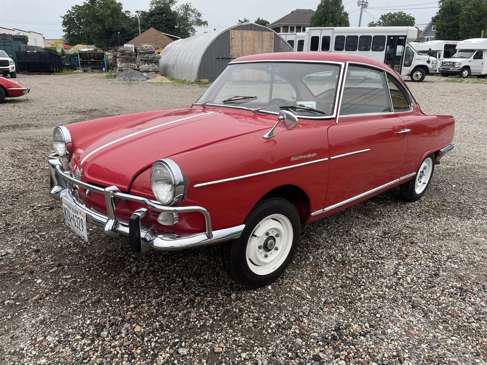 Front three-quarter photo of 1965 NSU Sport Prinz in red