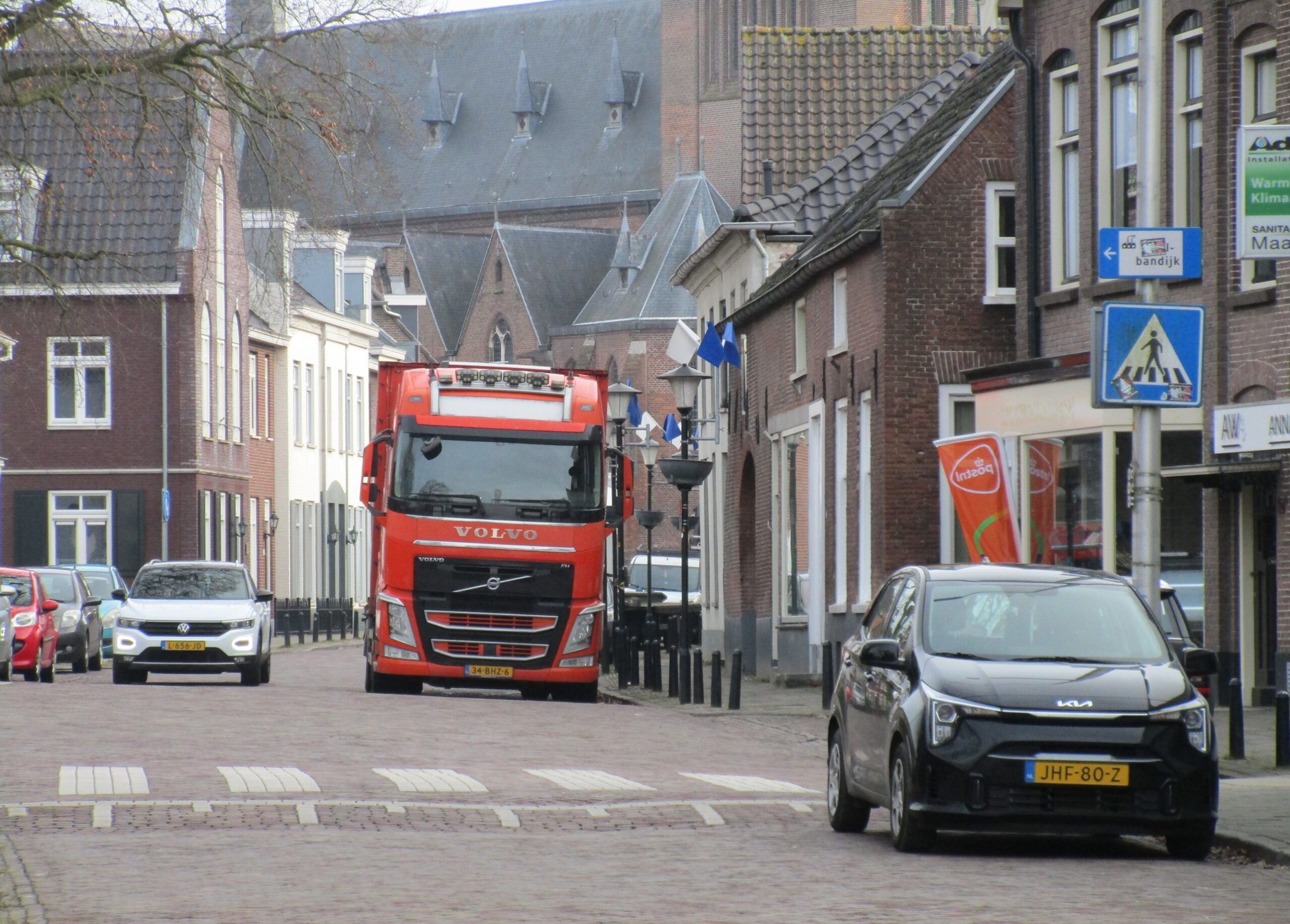 2016 Volvo FH 500 6x2*4 Truck - Setting Up a Party Tent For The 2026 Carnival Festivities 1 2016 Volvo FH 500 6x2*4 truck parked next to the curb in the center of Druten, the Netherlands - 1