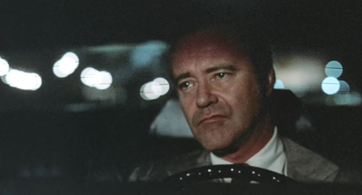 Why The 1972 Lincoln Continental Was The Perfect Movie Costar In This Jack Lemmon Drama 12 Movie screenshot of Jack Lemmon behind the wheel of a 1972 Lincoln at night, looking morose and pensive