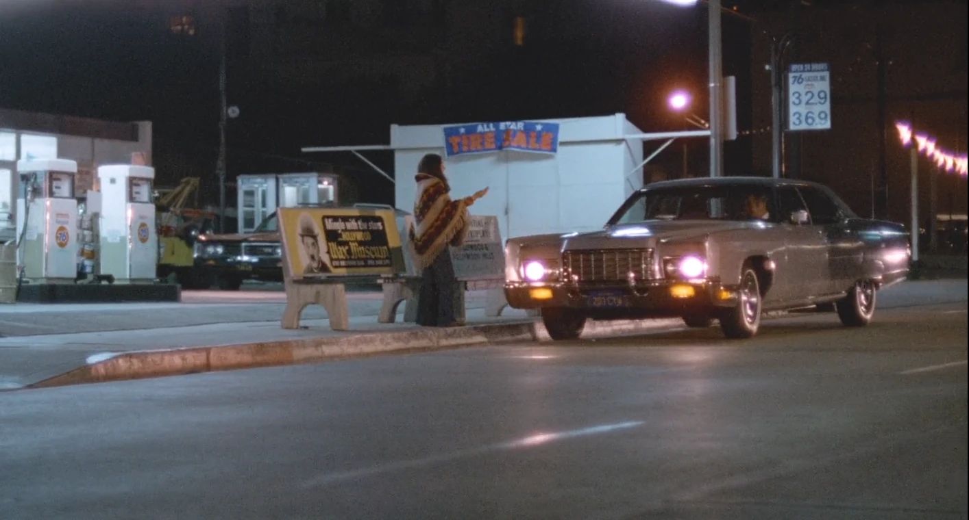 Why The 1972 Lincoln Continental Was The Perfect Movie Costar In This Jack Lemmon Drama 11 Movie screenshot of a 1972 Lincoln Continental sedan stopped at the side of the street to pick up a hitchhike (Laurie Heineman)
