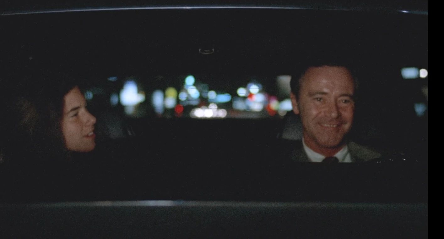 Why The 1972 Lincoln Continental Was The Perfect Movie Costar In This Jack Lemmon Drama 13 Movie screenshot of Laurie Heineman and Jack Lemmon in the front of a 1972 Lincoln, driving in the dark, both smiling