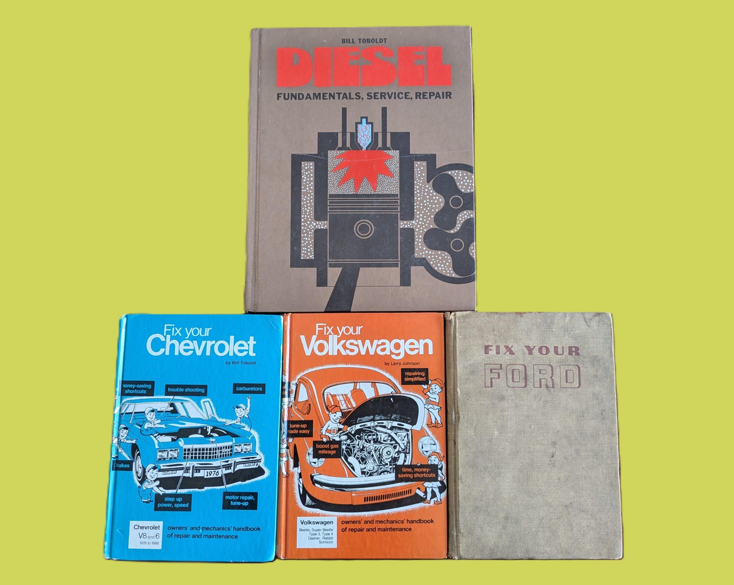 Goodheart-Willcox Repair Manuals: 100 Years Of How-To 1 Image of Goodheart-Willcox automotive repair manuals in front of a yellow background