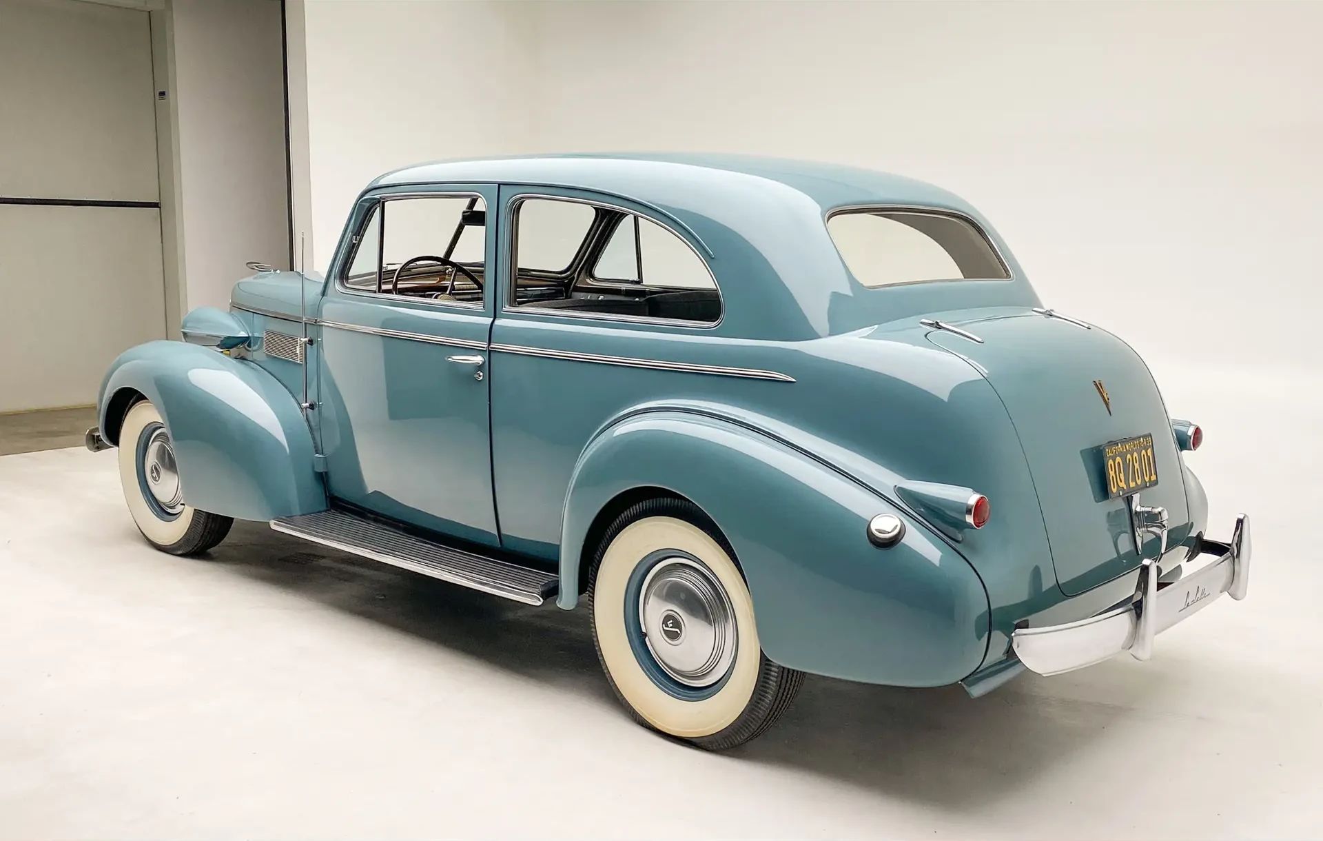 Left rear 3q view of a blue 1939 LaSalle