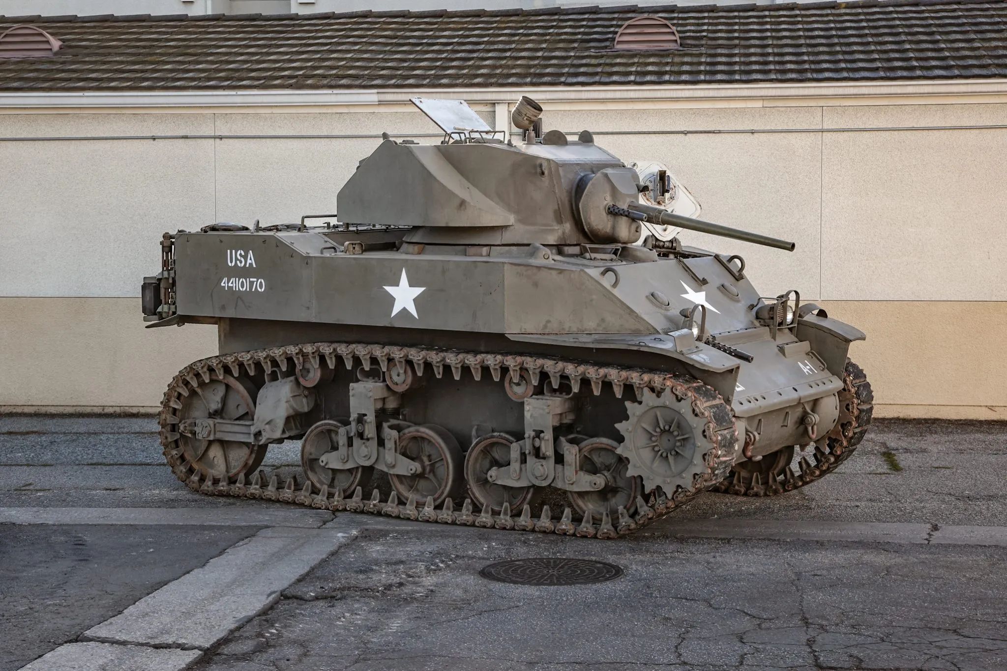 This WW2 Tank Is Powered By Twin Cadillac Engines And Hydra-Matic Transmissions, And It Was Parked Down The Street 28 Right front 3q view of an olive drab light tank