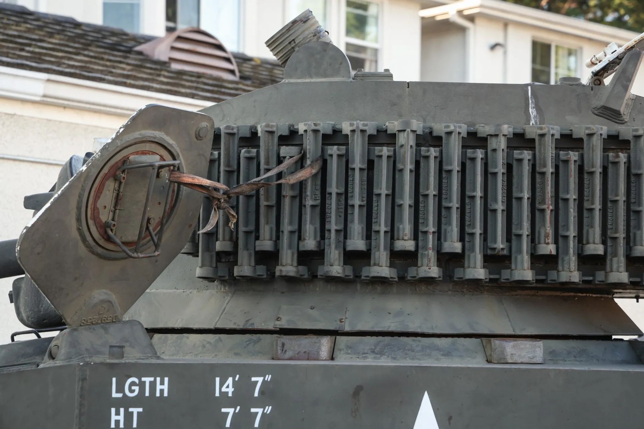 This WW2 Tank Is Powered By Twin Cadillac Engines And Hydra-Matic Transmissions, And It Was Parked Down The Street 26 Row of grousers on the turret of a tank