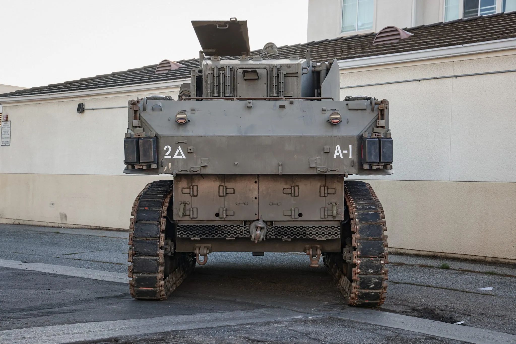 This WW2 Tank Is Powered By Twin Cadillac Engines And Hydra-Matic Transmissions, And It Was Parked Down The Street 24 Rear view of an M5A1 light tank