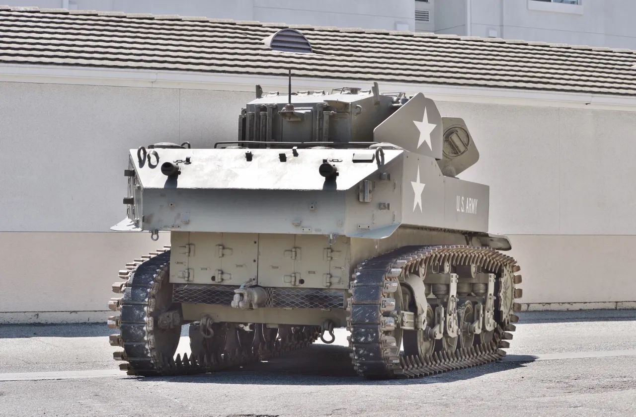 This WW2 Tank Is Powered By Twin Cadillac Engines And Hydra-Matic Transmissions, And It Was Parked Down The Street 3 Right rear 3q view of a different olive drab light tank