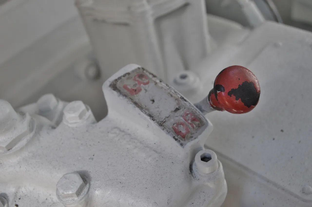 This WW2 Tank Is Powered By Twin Cadillac Engines And Hydra-Matic Transmissions, And It Was Parked Down The Street 21 Transfer case shift lever with LO and DR markings