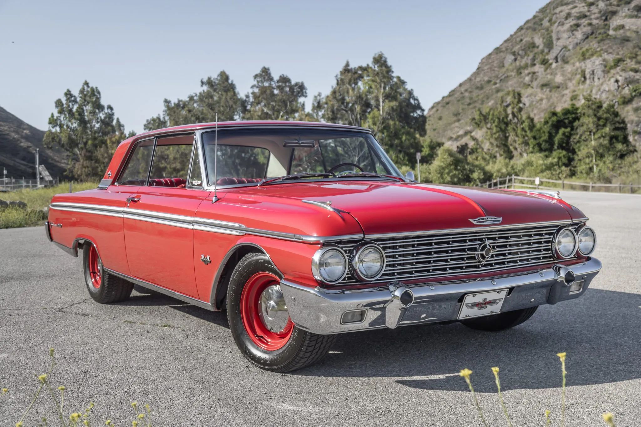 Front passenger three-quarter view of red 1962 Ford Galaxie 500XL