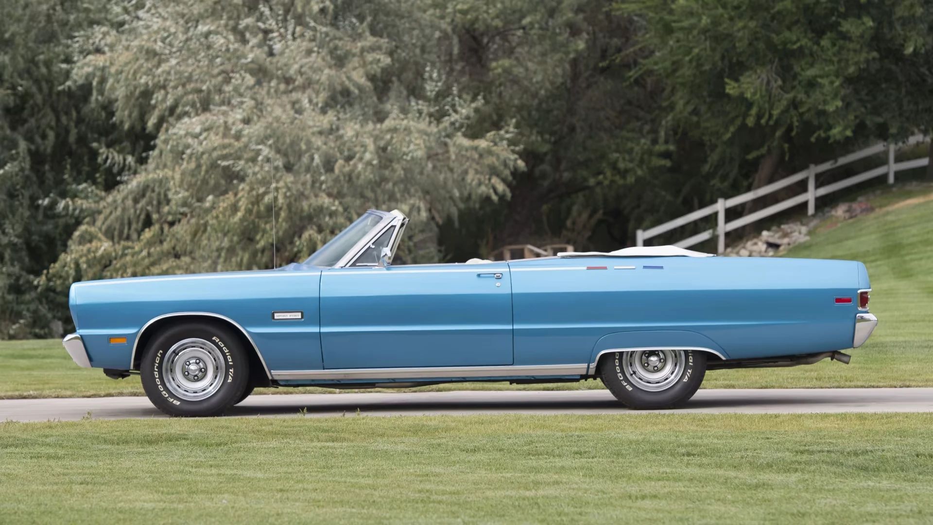 Left side view of a 1969 Plymouth C-body convertible with the top down