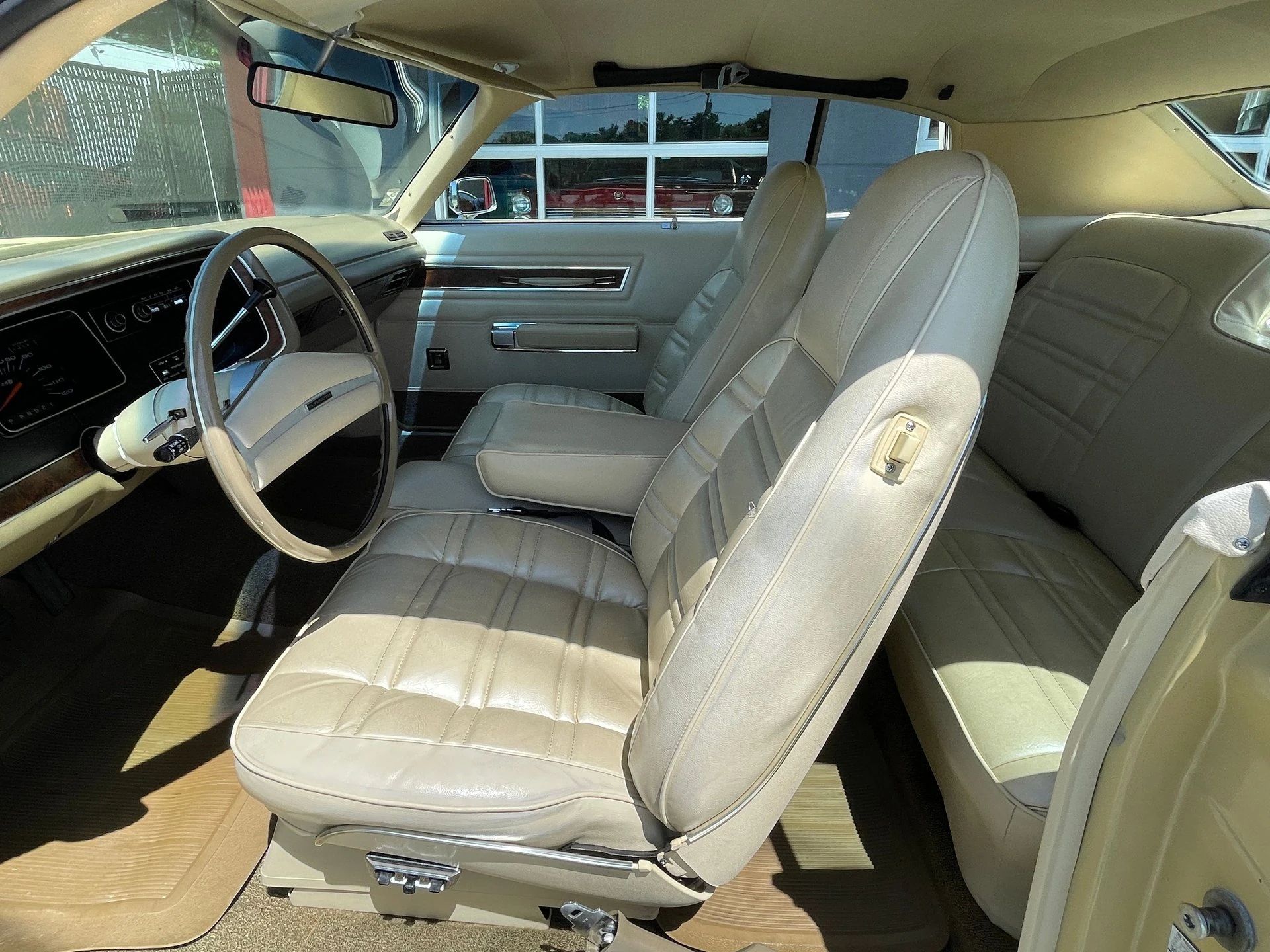 Front seats of a 1973 Plymouth C-body hardtop, seen through the driver's door
