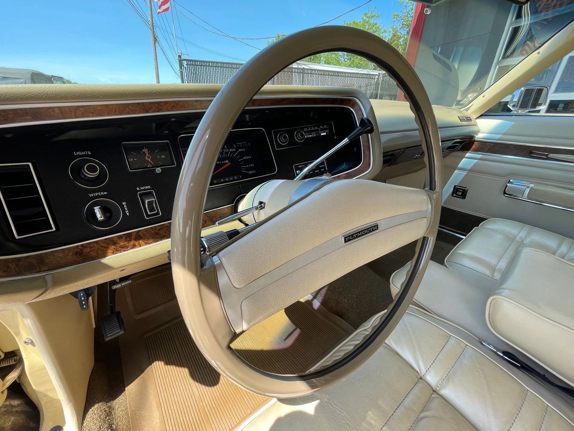 Steering wheel, dashboard, and bucket seats of a 1973 Plymouth C-body