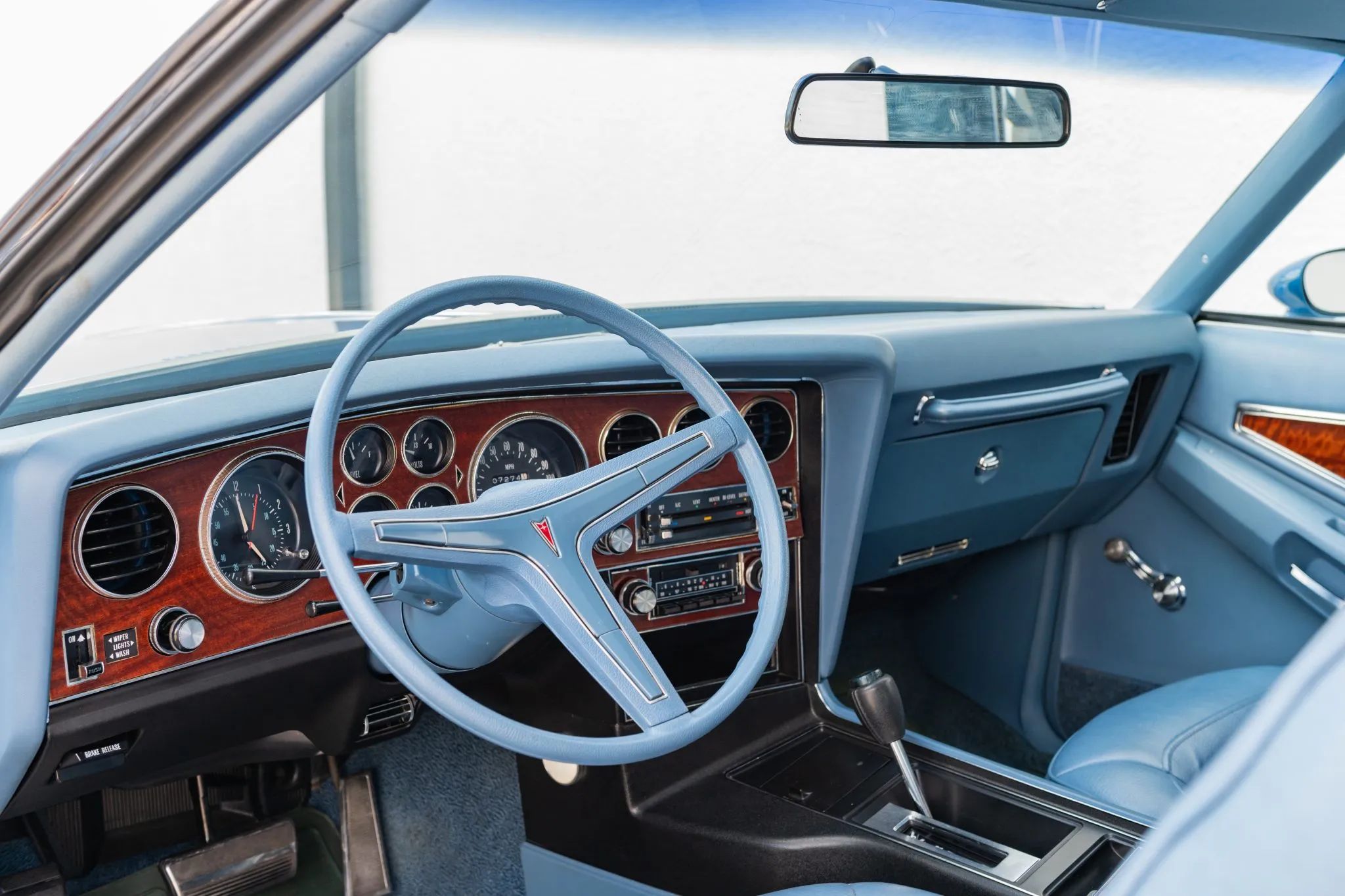 1973 Pontiac Grand Prix SJ 455: The Most Desirable Colonnade Grand Prix, In A Soulful Shade of Blue 12 Dashboard and steering wheel of a 1973 Grand Prix