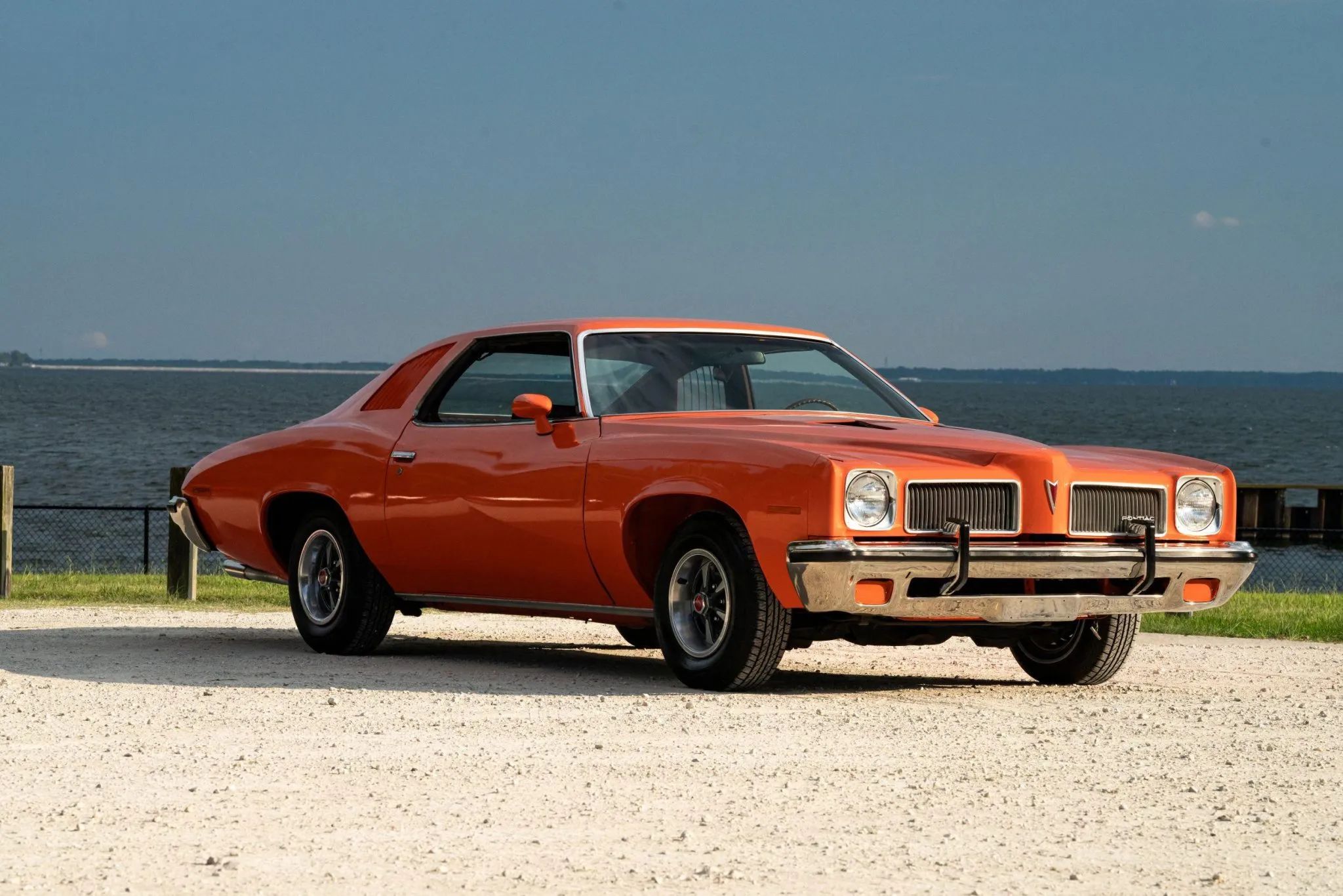 1973 Pontiac LeMans Sport Coupe: The Poor Man's GTO, With A 3-Speed Manual Transmission 13 Right front 3q view of an orange 1973 Pontiac Colonnade coupe
