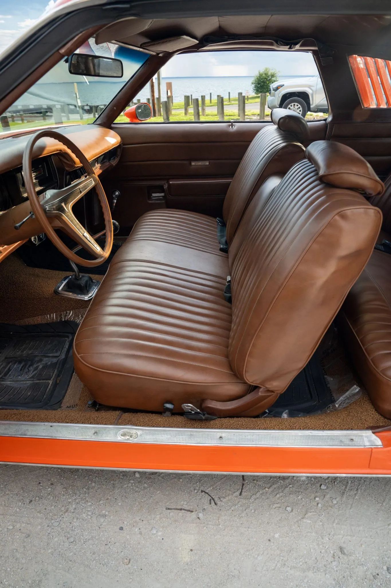 1973 Pontiac LeMans Sport Coupe: The Poor Man's GTO, With A 3-Speed Manual Transmission 8 Front seat of a 1973 Pontiac LeMans coupe with brown vinyl upholstery