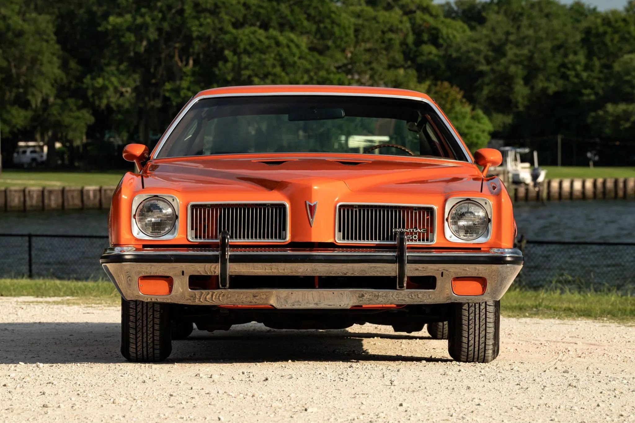 1973 Pontiac LeMans Sport Coupe: The Poor Man's GTO, With A 3-Speed Manual Transmission 5 Front view of an orange 1973 Pontiac LeMans