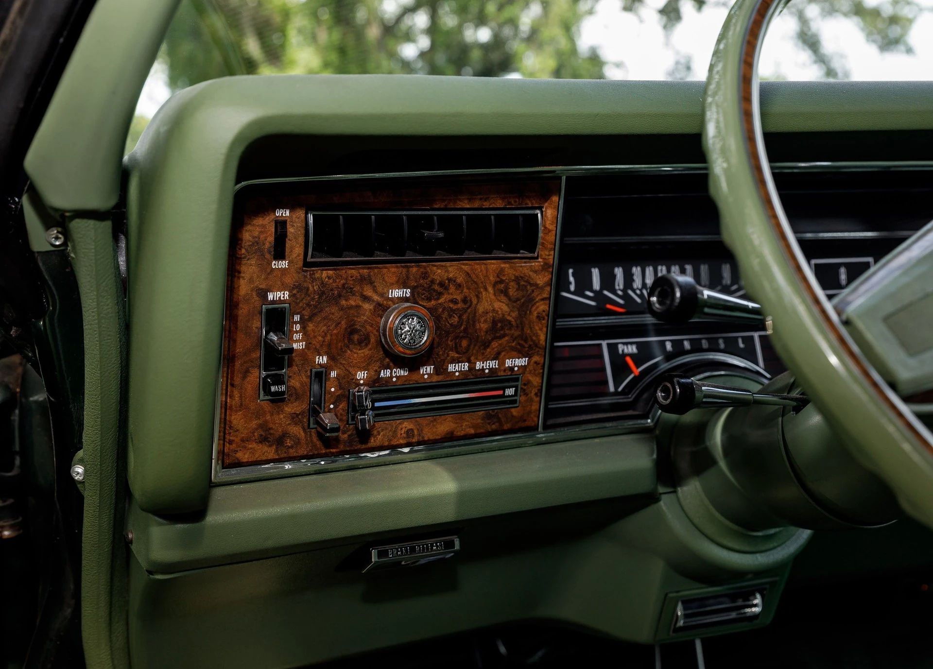 1974 Oldsmobile Toronado: Only 92 Miles And No Power Windows On This Triple-Green FWD Personal Luxury Coupe 13 Left side of the dashboard of a 1974 Toronado with a green interior