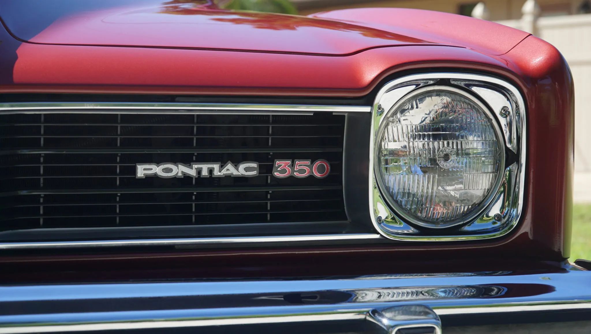 1974 Pontiac LeMans GT 350 4-Speed: The GTO's Understudy Takes The Stage 15 "Pontiac 350" badges on the left grille of a 1974 LeMans